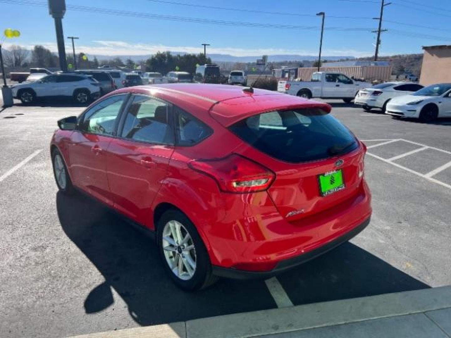 2015 Race Red /Charcoal Black Ford Focus SE (1FADP3K28FL) with an 2L I-4 gasoline direct injection engine, Automatic transmission, located at 1865 East Red Hills Pkwy, St. George, 84770, (435) 628-0023, 37.120850, -113.543640 - We specialize in helping ALL people get the best financing available. No matter your credit score, good, bad or none we can get you an amazing rate. Had a bankruptcy, divorce, or repossessions? We give you the green light to get your credit back on the road. Low down and affordable payments that fit - Photo#4