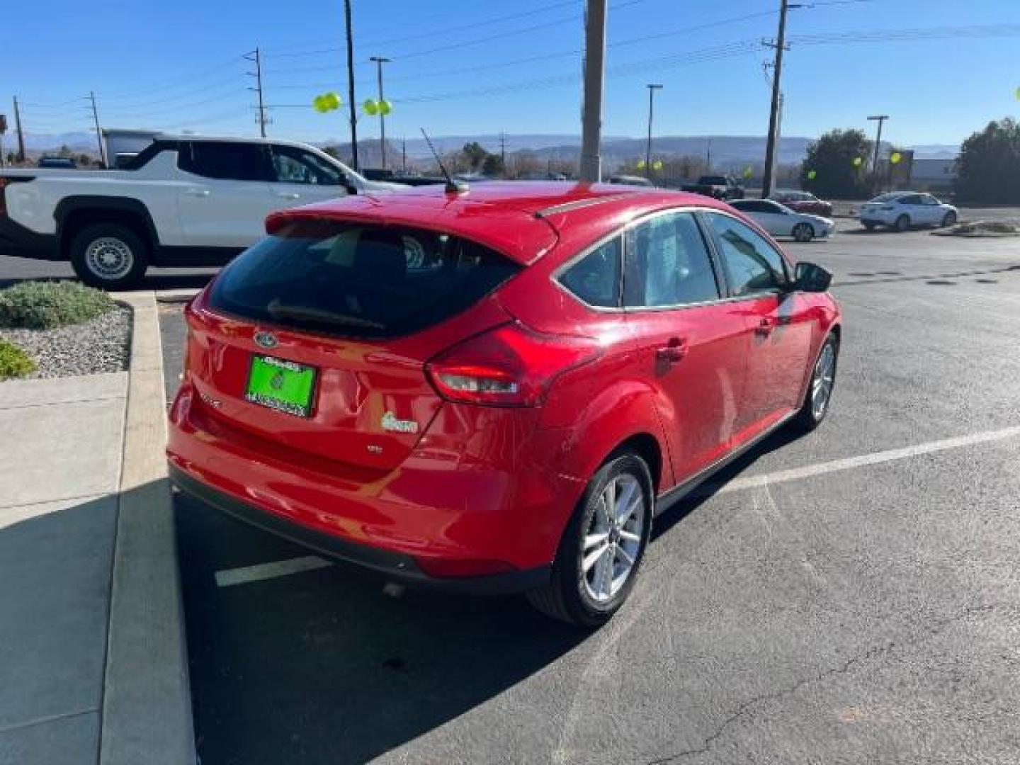 2015 Race Red /Charcoal Black Ford Focus SE (1FADP3K28FL) with an 2L I-4 gasoline direct injection engine, Automatic transmission, located at 1865 East Red Hills Pkwy, St. George, 84770, (435) 628-0023, 37.120850, -113.543640 - We specialize in helping ALL people get the best financing available. No matter your credit score, good, bad or none we can get you an amazing rate. Had a bankruptcy, divorce, or repossessions? We give you the green light to get your credit back on the road. Low down and affordable payments that fit - Photo#6
