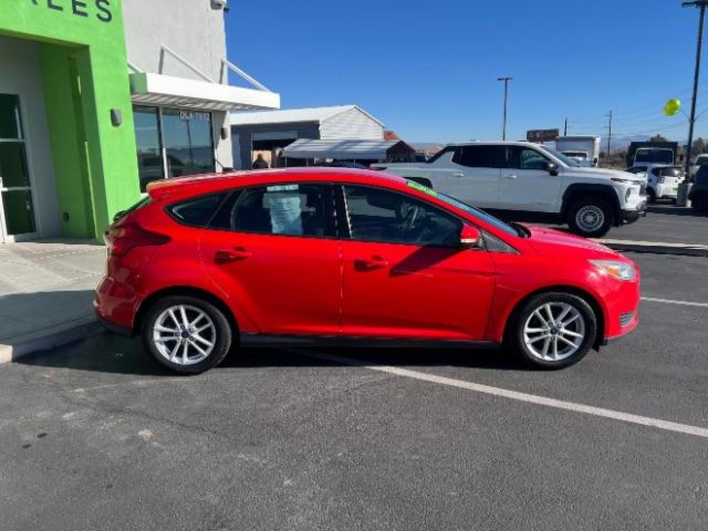 2015 Race Red /Charcoal Black Ford Focus SE (1FADP3K28FL) with an 2L I-4 gasoline direct injection engine, Automatic transmission, located at 1865 East Red Hills Pkwy, St. George, 84770, (435) 628-0023, 37.120850, -113.543640 - We specialize in helping ALL people get the best financing available. No matter your credit score, good, bad or none we can get you an amazing rate. Had a bankruptcy, divorce, or repossessions? We give you the green light to get your credit back on the road. Low down and affordable payments that fit - Photo#7