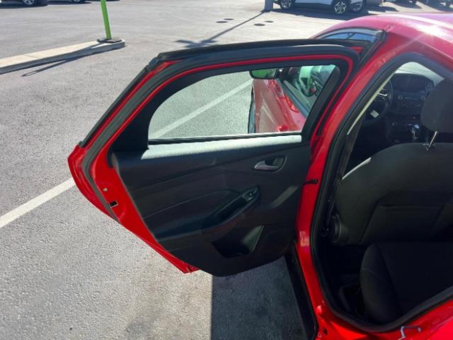 2015 Race Red /Charcoal Black Ford Focus SE (1FADP3K28FL) with an 2L I-4 gasoline direct injection engine, Automatic transmission, located at 1865 East Red Hills Pkwy, St. George, 84770, (435) 628-0023, 37.120850, -113.543640 - We specialize in helping ALL people get the best financing available. No matter your credit score, good, bad or none we can get you an amazing rate. Had a bankruptcy, divorce, or repossessions? We give you the green light to get your credit back on the road. Low down and affordable payments that fit - Photo#20