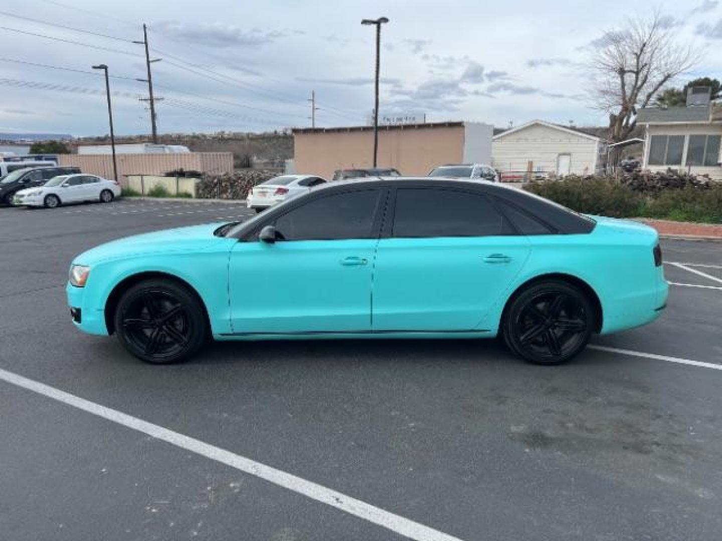 2013 Cyan /Black Leather Interior Audi A8 3.0 Sedan L quattro Tiptronic (WAURGAFD6DN) with an 3.0L V6 DOHC 24V SUPERCHARGED engine, 6-Speed Automatic transmission, located at 940 North Main Street, Cedar City, UT, 84720, (435) 628-0023, 37.692936, -113.061897 - We specialize in helping ALL people get the best financing available. No matter your credit score, good, bad or none we can get you an amazing rate. Had a bankruptcy, divorce, or repossessions? We give you the green light to get your credit back on the road. Low down and affordable payments that fit - Photo#3