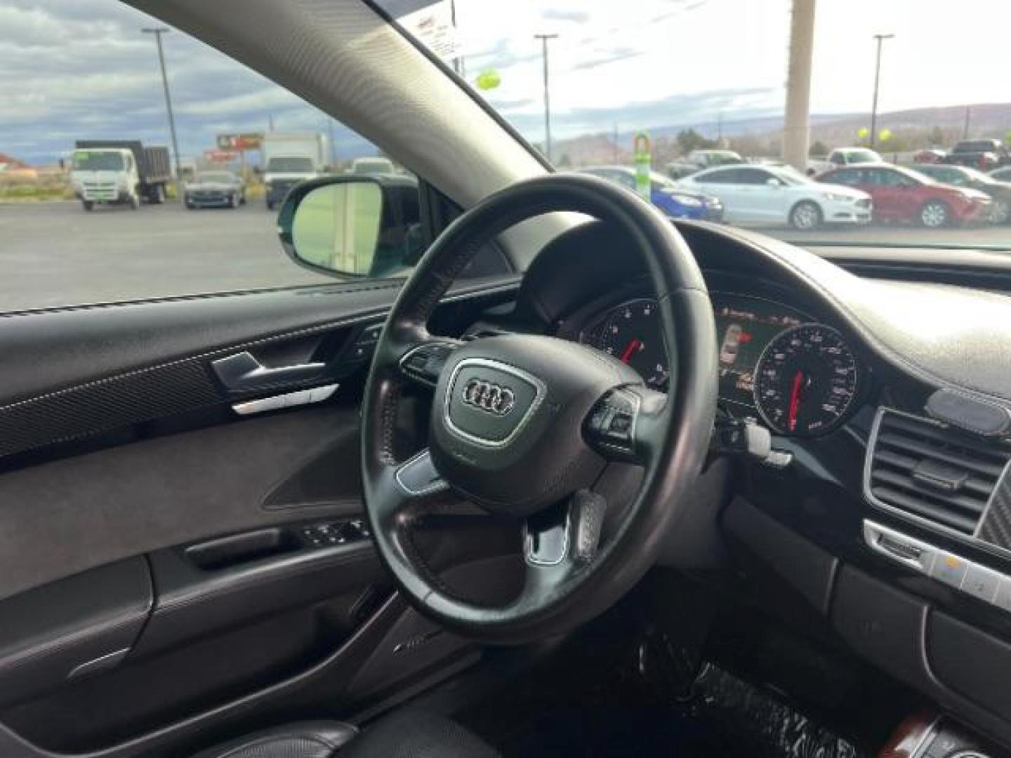 2013 Cyan /Black Leather Interior Audi A8 3.0 Sedan L quattro Tiptronic (WAURGAFD6DN) with an 3.0L V6 DOHC 24V SUPERCHARGED engine, 6-Speed Automatic transmission, located at 940 North Main Street, Cedar City, UT, 84720, (435) 628-0023, 37.692936, -113.061897 - We specialize in helping ALL people get the best financing available. No matter your credit score, good, bad or none we can get you an amazing rate. Had a bankruptcy, divorce, or repossessions? We give you the green light to get your credit back on the road. Low down and affordable payments that fit - Photo#30