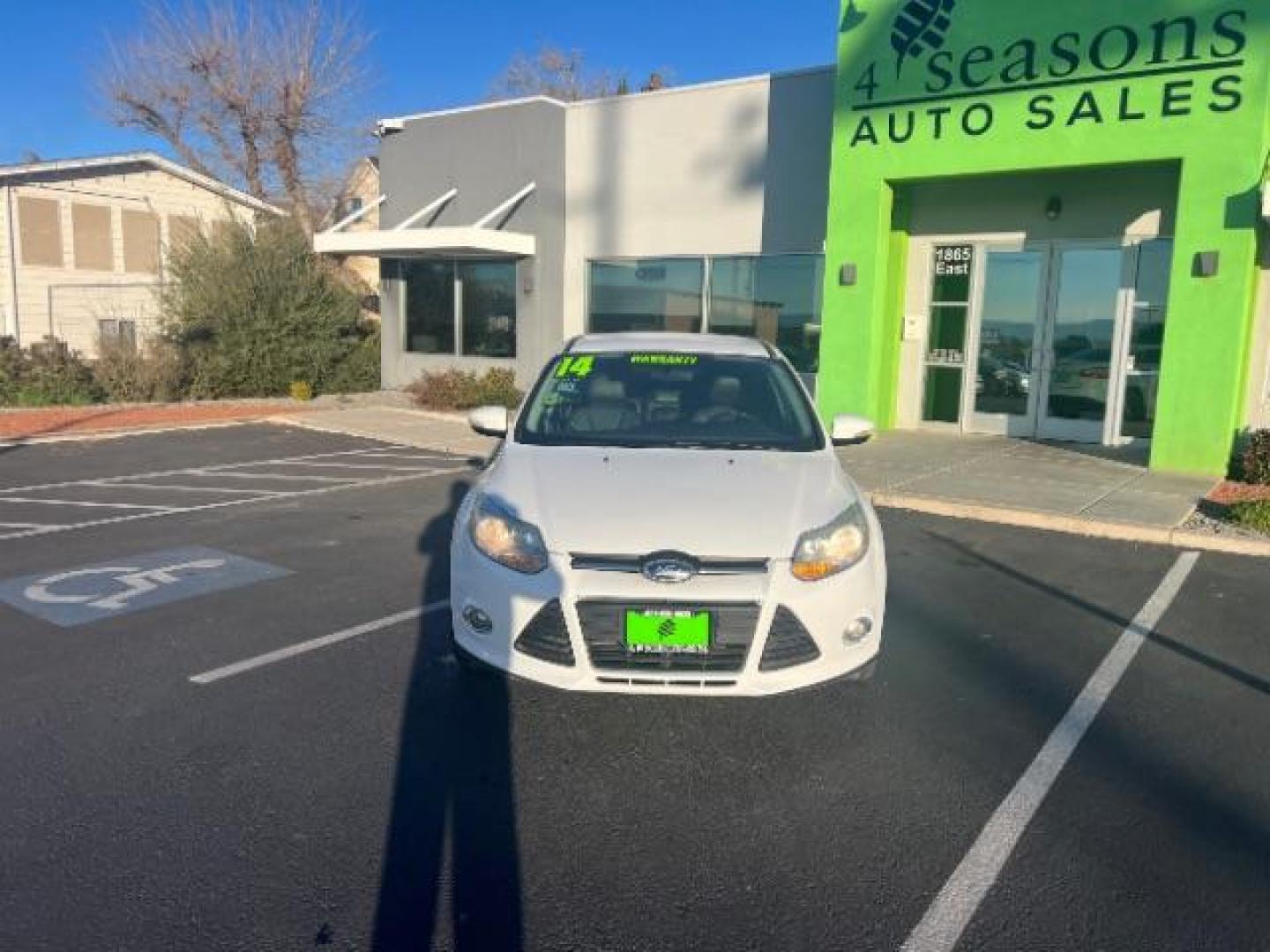 2014 Oxford White /Charcoal Black Ford Focus SE (1FADP3F27EL) with an 2L I-4 gasoline direct injection engine, Automatic transmission, located at 1865 East Red Hills Pkwy, St. George, 84770, (435) 628-0023, 37.120850, -113.543640 - We specialize in helping ALL people get the best financing available. No matter your credit score, good, bad or none we can get you an amazing rate. Had a bankruptcy, divorce, or repossessions? We give you the green light to get your credit back on the road. Low down and affordable payments that fit - Photo#1