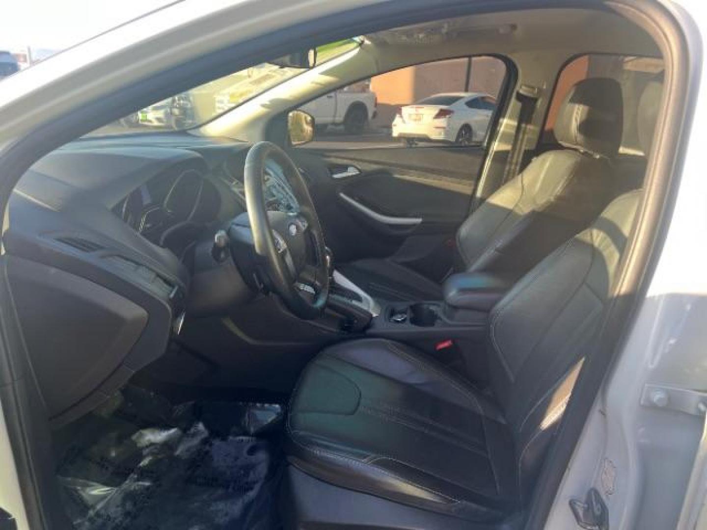 2014 Oxford White /Charcoal Black Ford Focus SE (1FADP3F27EL) with an 2L I-4 gasoline direct injection engine, Automatic transmission, located at 1865 East Red Hills Pkwy, St. George, 84770, (435) 628-0023, 37.120850, -113.543640 - We specialize in helping ALL people get the best financing available. No matter your credit score, good, bad or none we can get you an amazing rate. Had a bankruptcy, divorce, or repossessions? We give you the green light to get your credit back on the road. Low down and affordable payments that fit - Photo#14
