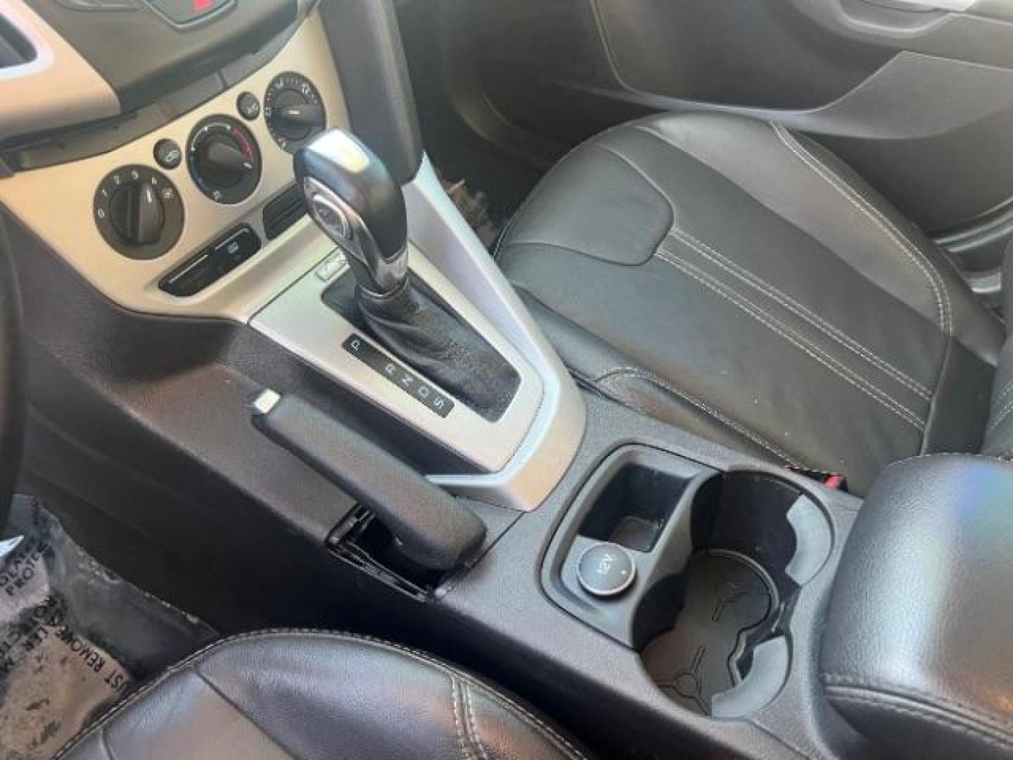 2014 Oxford White /Charcoal Black Ford Focus SE (1FADP3F27EL) with an 2L I-4 gasoline direct injection engine, Automatic transmission, located at 1865 East Red Hills Pkwy, St. George, 84770, (435) 628-0023, 37.120850, -113.543640 - We specialize in helping ALL people get the best financing available. No matter your credit score, good, bad or none we can get you an amazing rate. Had a bankruptcy, divorce, or repossessions? We give you the green light to get your credit back on the road. Low down and affordable payments that fit - Photo#18
