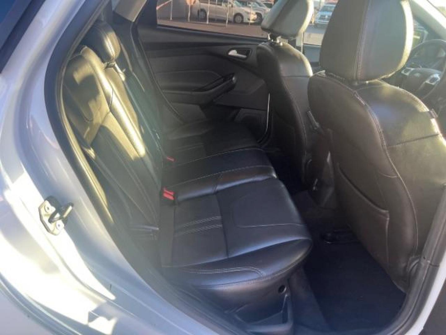 2014 Oxford White /Charcoal Black Ford Focus SE (1FADP3F27EL) with an 2L I-4 gasoline direct injection engine, Automatic transmission, located at 1865 East Red Hills Pkwy, St. George, 84770, (435) 628-0023, 37.120850, -113.543640 - We specialize in helping ALL people get the best financing available. No matter your credit score, good, bad or none we can get you an amazing rate. Had a bankruptcy, divorce, or repossessions? We give you the green light to get your credit back on the road. Low down and affordable payments that fit - Photo#26
