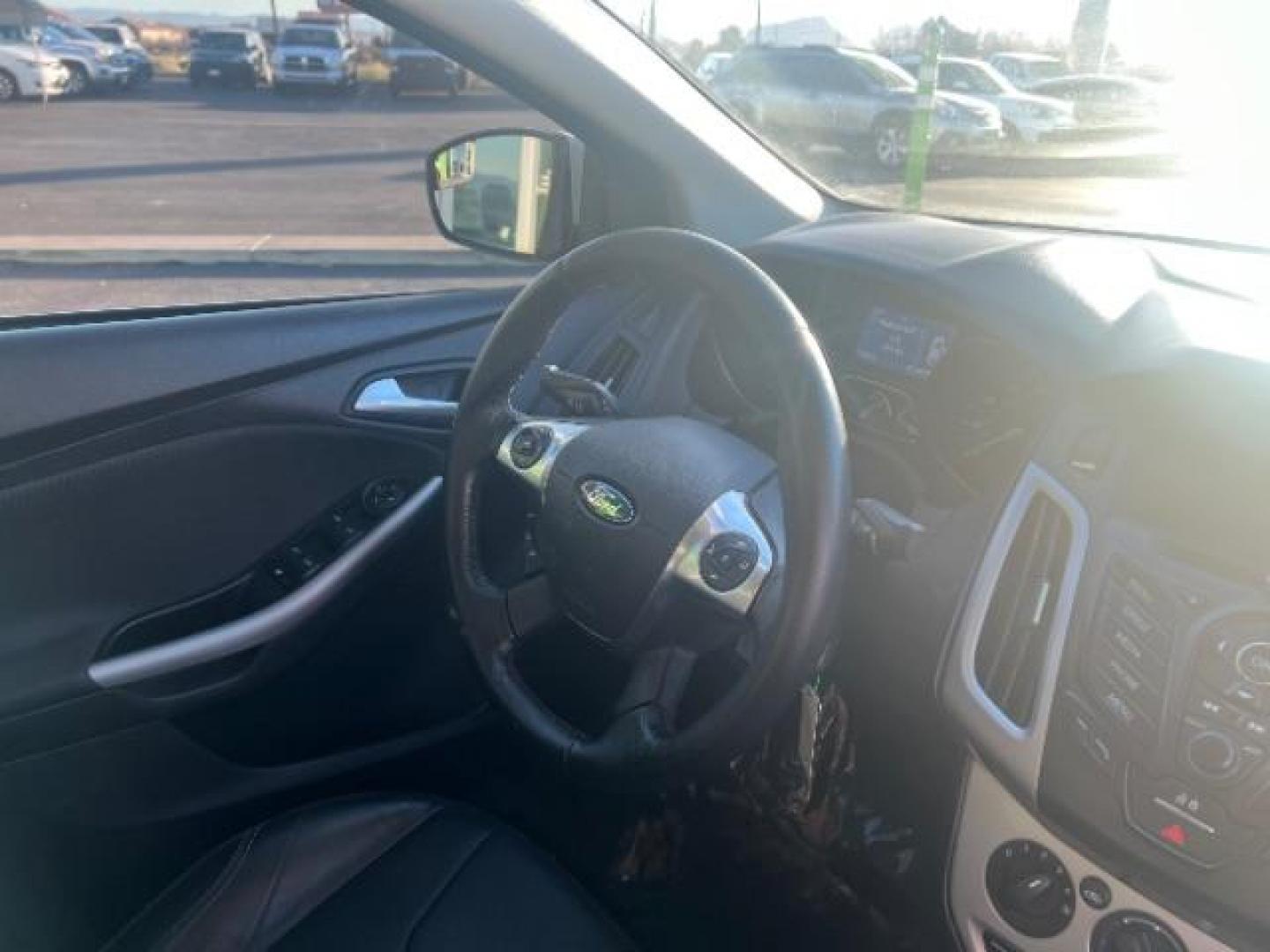 2014 Oxford White /Charcoal Black Ford Focus SE (1FADP3F27EL) with an 2L I-4 gasoline direct injection engine, Automatic transmission, located at 1865 East Red Hills Pkwy, St. George, 84770, (435) 628-0023, 37.120850, -113.543640 - We specialize in helping ALL people get the best financing available. No matter your credit score, good, bad or none we can get you an amazing rate. Had a bankruptcy, divorce, or repossessions? We give you the green light to get your credit back on the road. Low down and affordable payments that fit - Photo#30