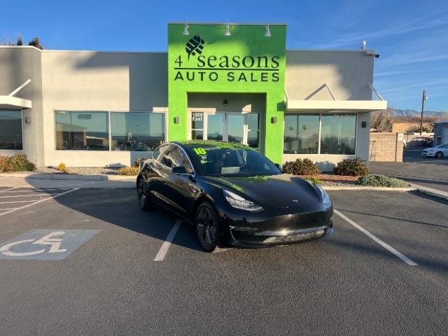 2018 Solid Black /Black Tesla Model 3 Long Range (5YJ3E1EA1JF) with an ELECTRIC engine, Electric transmission, located at 1865 East Red Hills Pkwy, St. George, 84770, (435) 628-0023, 37.120850, -113.543640 - This 2018 Model 3 Long Range has Full Self Driving software paid for! Thats a $8k upgrade that is no longer available to be bought after Feb 14th. Lock in FSD for life. Every Tesla we sell comes with a charger! Excellent condition and very low miles. Gets 272 on a full charge. Has full Tesla warr - Photo#0