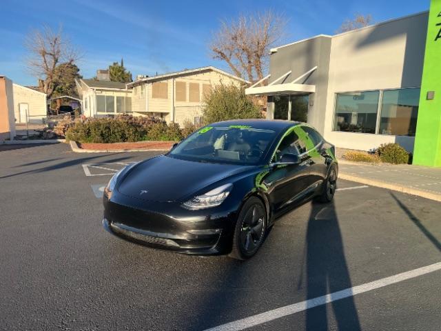 2018 Solid Black /Black Tesla Model 3 Long Range (5YJ3E1EA1JF) with an ELECTRIC engine, Electric transmission, located at 1865 East Red Hills Pkwy, St. George, 84770, (435) 628-0023, 37.120850, -113.543640 - This 2018 Model 3 Long Range has Full Self Driving software paid for! Thats a $8k upgrade that is no longer available to be bought after Feb 14th. Lock in FSD for life. Every Tesla we sell comes with a charger! Excellent condition and very low miles. Gets 272 on a full charge. Has full Tesla warr - Photo#4