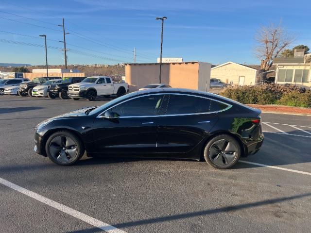 2018 Solid Black /Black Tesla Model 3 Long Range (5YJ3E1EA1JF) with an ELECTRIC engine, Electric transmission, located at 1865 East Red Hills Pkwy, St. George, 84770, (435) 628-0023, 37.120850, -113.543640 - This 2018 Model 3 Long Range has Full Self Driving software paid for! Thats a $8k upgrade that is no longer available to be bought after Feb 14th. Lock in FSD for life. Every Tesla we sell comes with a charger! Excellent condition and very low miles. Gets 272 on a full charge. Has full Tesla warr - Photo#5