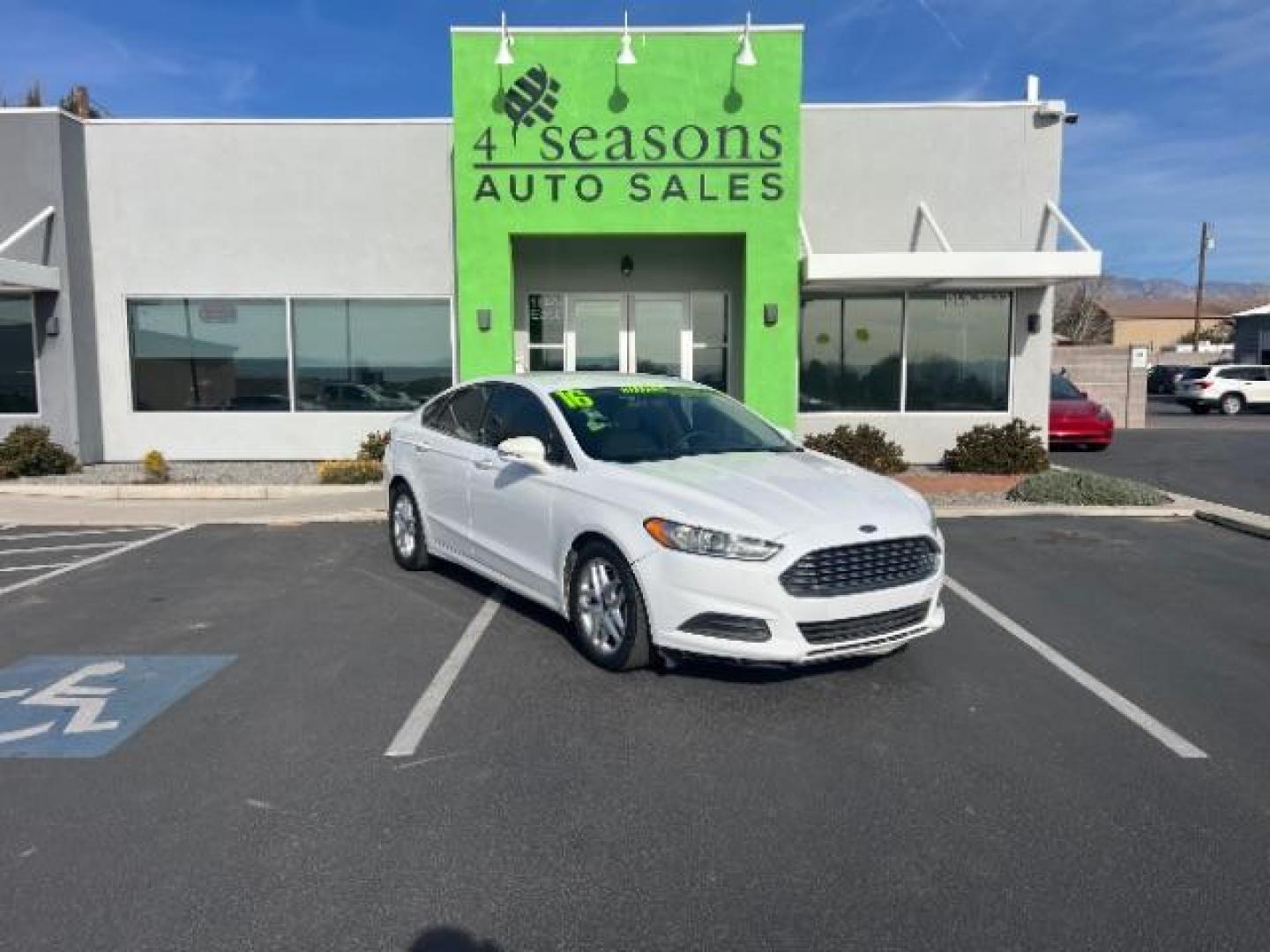 2016 Oxford White /Dune Ford Fusion SE (3FA6P0H79GR) with an Duratec 2.5L I-4 DOHC engine, Automatic transmission, located at 1865 East Red Hills Pkwy, St. George, 84770, (435) 628-0023, 37.120850, -113.543640 - We specialize in helping ALL people get the best financing available. No matter your credit score, good, bad or none we can get you an amazing rate. Had a bankruptcy, divorce, or repossessions? We give you the green light to get your credit back on the road. Low down and affordable payments that fit - Photo#0