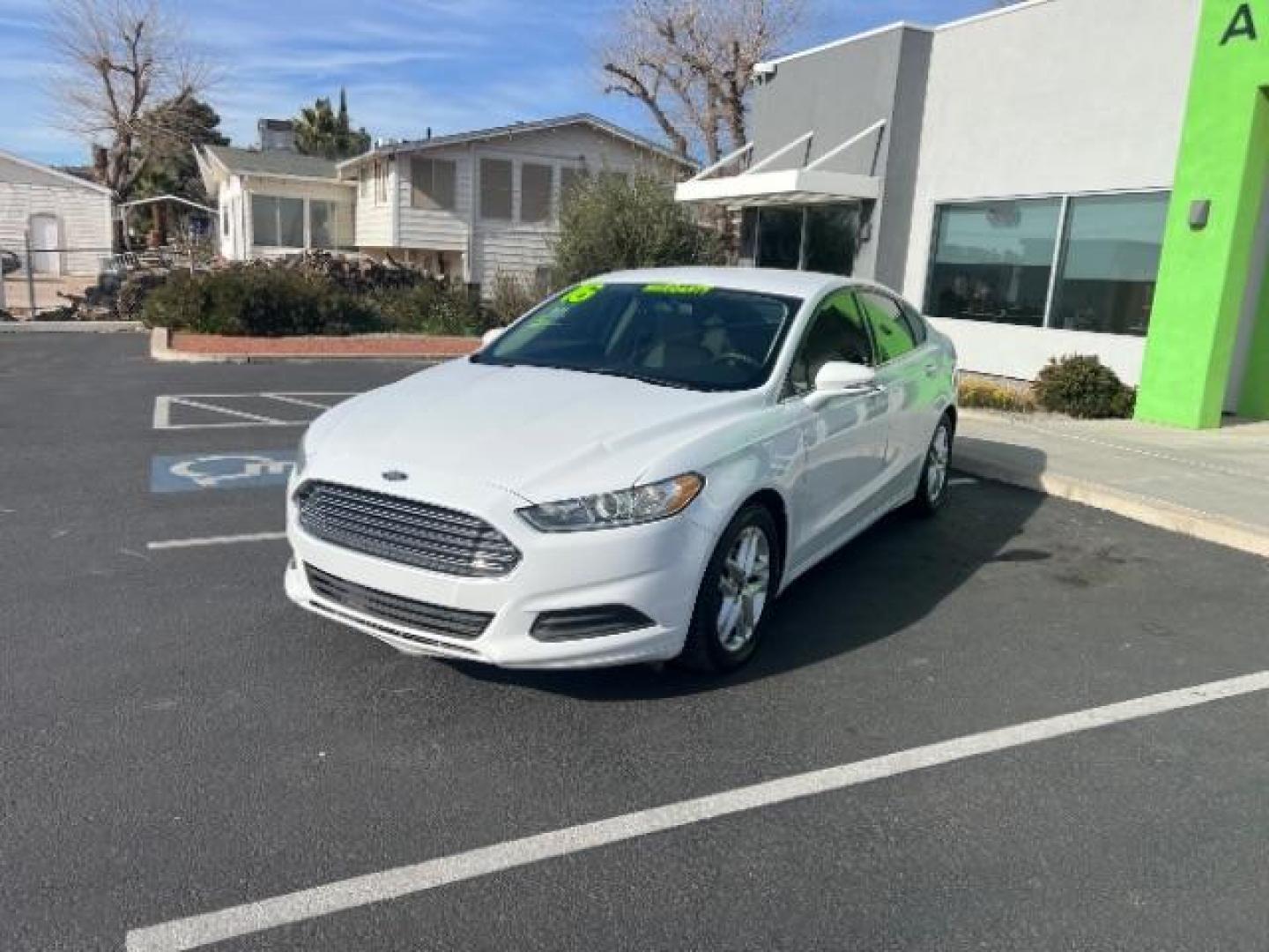 2016 Oxford White /Dune Ford Fusion SE (3FA6P0H79GR) with an Duratec 2.5L I-4 DOHC engine, Automatic transmission, located at 1865 East Red Hills Pkwy, St. George, 84770, (435) 628-0023, 37.120850, -113.543640 - We specialize in helping ALL people get the best financing available. No matter your credit score, good, bad or none we can get you an amazing rate. Had a bankruptcy, divorce, or repossessions? We give you the green light to get your credit back on the road. Low down and affordable payments that fit - Photo#2