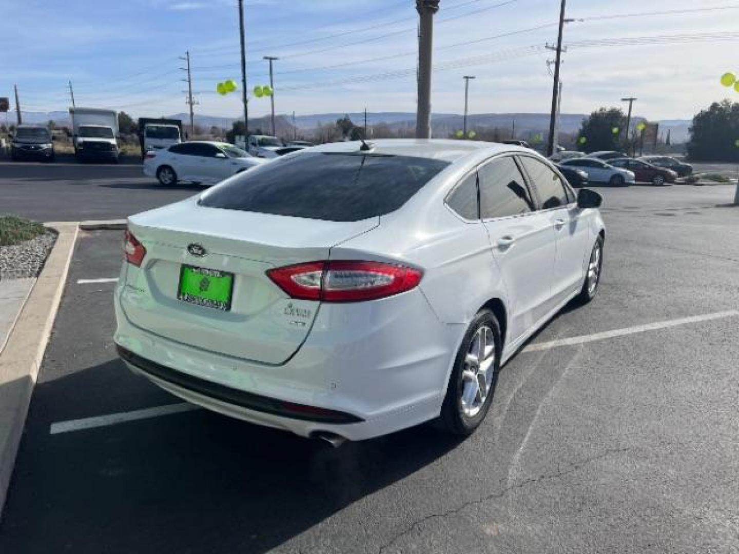 2016 Oxford White /Dune Ford Fusion SE (3FA6P0H79GR) with an Duratec 2.5L I-4 DOHC engine, Automatic transmission, located at 1865 East Red Hills Pkwy, St. George, 84770, (435) 628-0023, 37.120850, -113.543640 - We specialize in helping ALL people get the best financing available. No matter your credit score, good, bad or none we can get you an amazing rate. Had a bankruptcy, divorce, or repossessions? We give you the green light to get your credit back on the road. Low down and affordable payments that fit - Photo#6