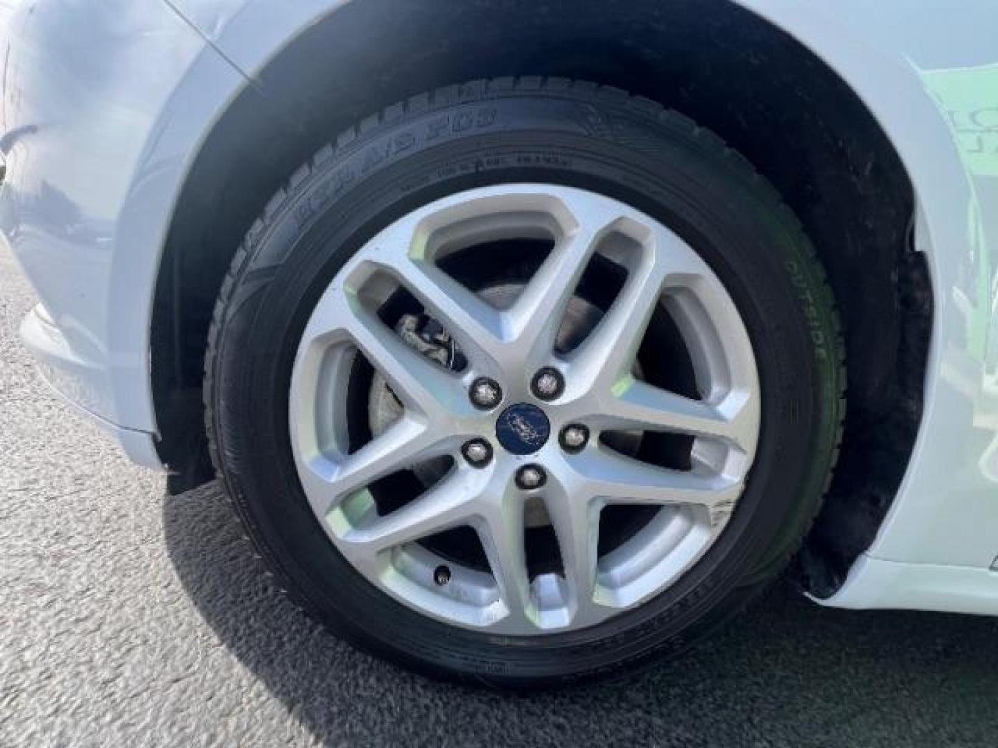 2016 Oxford White /Dune Ford Fusion SE (3FA6P0H79GR) with an Duratec 2.5L I-4 DOHC engine, Automatic transmission, located at 1865 East Red Hills Pkwy, St. George, 84770, (435) 628-0023, 37.120850, -113.543640 - We specialize in helping ALL people get the best financing available. No matter your credit score, good, bad or none we can get you an amazing rate. Had a bankruptcy, divorce, or repossessions? We give you the green light to get your credit back on the road. Low down and affordable payments that fit - Photo#11