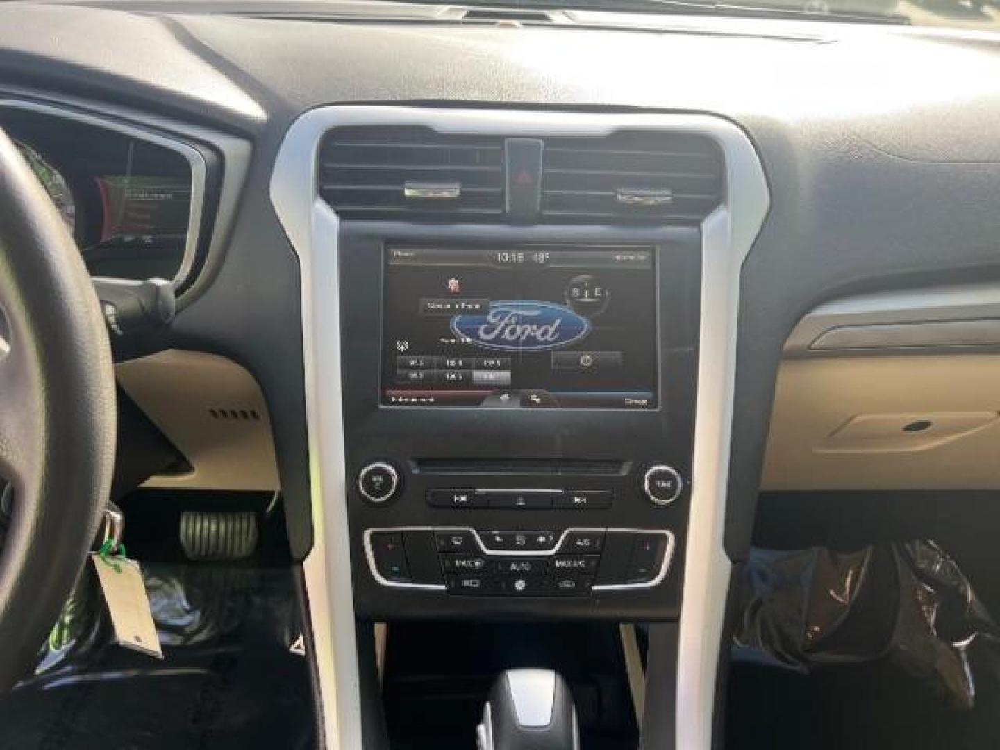 2016 Oxford White /Dune Ford Fusion SE (3FA6P0H79GR) with an Duratec 2.5L I-4 DOHC engine, Automatic transmission, located at 1865 East Red Hills Pkwy, St. George, 84770, (435) 628-0023, 37.120850, -113.543640 - We specialize in helping ALL people get the best financing available. No matter your credit score, good, bad or none we can get you an amazing rate. Had a bankruptcy, divorce, or repossessions? We give you the green light to get your credit back on the road. Low down and affordable payments that fit - Photo#17