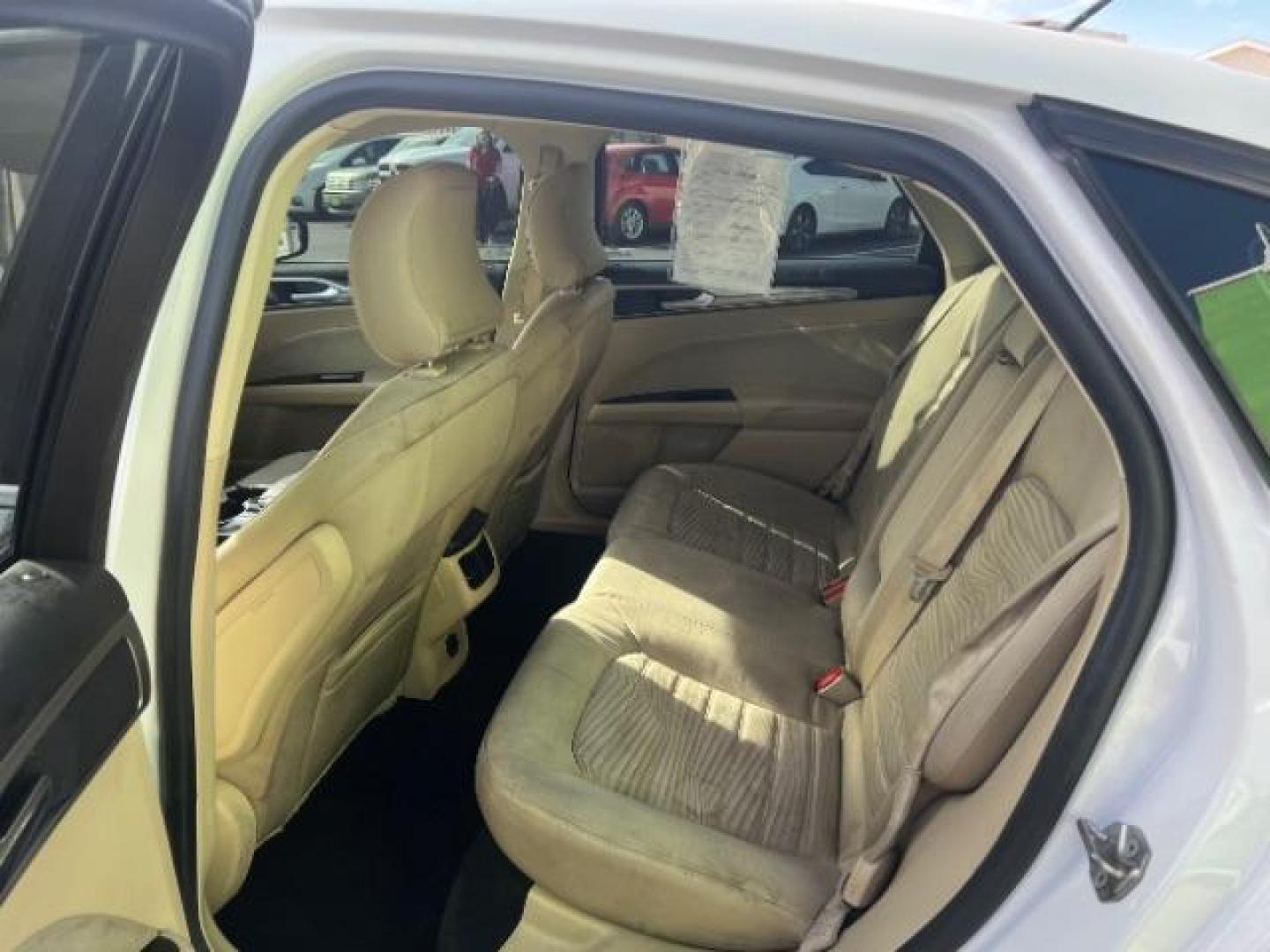 2016 Oxford White /Dune Ford Fusion SE (3FA6P0H79GR) with an Duratec 2.5L I-4 DOHC engine, Automatic transmission, located at 1865 East Red Hills Pkwy, St. George, 84770, (435) 628-0023, 37.120850, -113.543640 - We specialize in helping ALL people get the best financing available. No matter your credit score, good, bad or none we can get you an amazing rate. Had a bankruptcy, divorce, or repossessions? We give you the green light to get your credit back on the road. Low down and affordable payments that fit - Photo#21