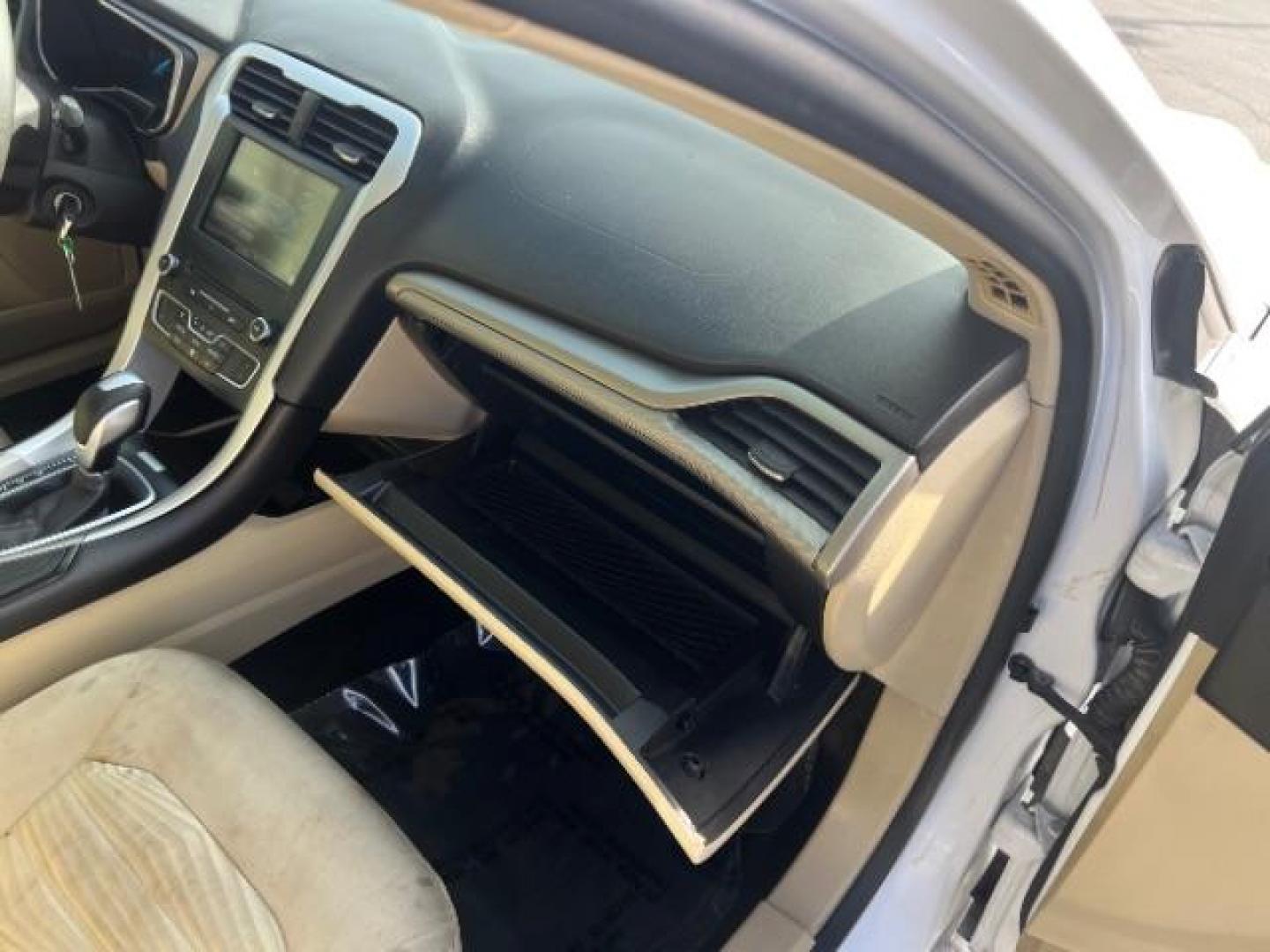 2016 Oxford White /Dune Ford Fusion SE (3FA6P0H79GR) with an Duratec 2.5L I-4 DOHC engine, Automatic transmission, located at 1865 East Red Hills Pkwy, St. George, 84770, (435) 628-0023, 37.120850, -113.543640 - We specialize in helping ALL people get the best financing available. No matter your credit score, good, bad or none we can get you an amazing rate. Had a bankruptcy, divorce, or repossessions? We give you the green light to get your credit back on the road. Low down and affordable payments that fit - Photo#29