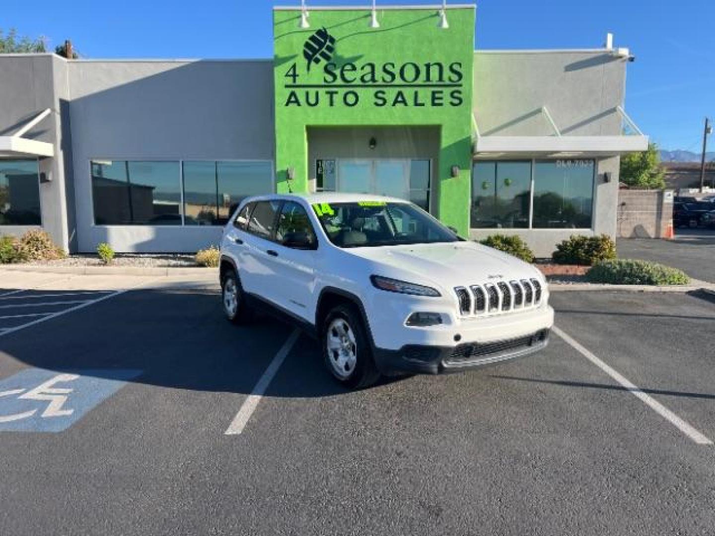 2014 Bright White Clearcoat /Black/Iceland Gray Jeep Cherokee Sport (1C4PJLAB6EW) with an MultiAir2 Tigershark 2.4L I-4 variable valve contr engine, Automatic transmission, located at 940 North Main Street, Cedar City, UT, 84720, (435) 628-0023, 37.692936, -113.061897 - We specialize in helping ALL people get the best financing available. No matter your credit score, good, bad or none we can get you an amazing rate. Had a bankruptcy, divorce, or repossessions? We give you the green light to get your credit back on the road. Low down and affordable payments that fit - Photo#0