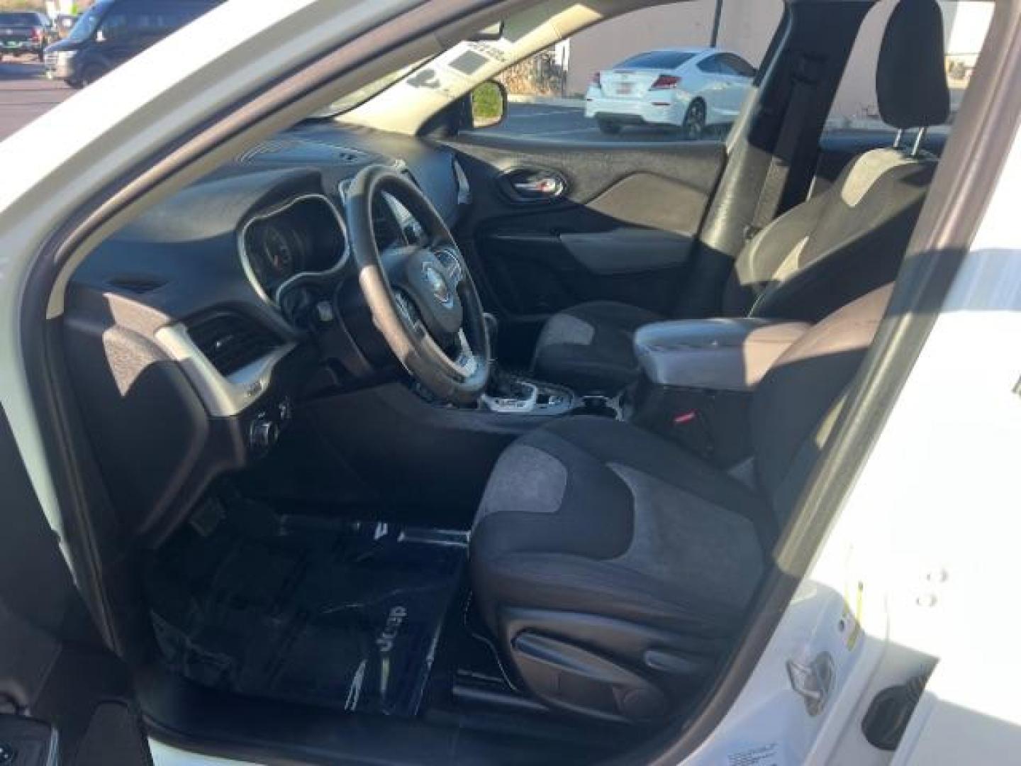 2014 Bright White Clearcoat /Black/Iceland Gray Jeep Cherokee Sport (1C4PJLAB6EW) with an MultiAir2 Tigershark 2.4L I-4 variable valve contr engine, Automatic transmission, located at 940 North Main Street, Cedar City, UT, 84720, (435) 628-0023, 37.692936, -113.061897 - We specialize in helping ALL people get the best financing available. No matter your credit score, good, bad or none we can get you an amazing rate. Had a bankruptcy, divorce, or repossessions? We give you the green light to get your credit back on the road. Low down and affordable payments that fit - Photo#14