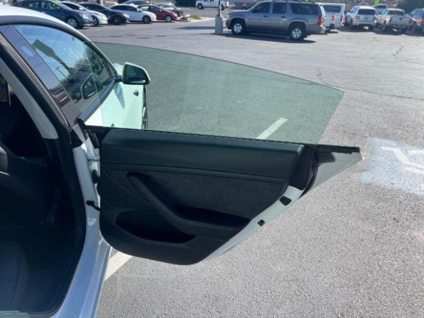 2022 Pearl White Multi-Coat /Black Tesla Model 3 Long Range Dual Motor All-Wheel Drive (5YJ3E1EBXNF) with an ELECTRIC engine, Automatic transmission, located at 1865 East Red Hills Pkwy, St. George, 84770, (435) 628-0023, 37.120850, -113.543640 - Excellent condition Tesla Model 3 Long range AWD with FULL SELF DRIVING subscription paid for. ($8 software unlock that will no longer be available to buy after Feb 14th) Lock in your FSD ownership now. Also, be to first in line to upgrade from HW3 to HW4 when Tesla makes the upgrade available as p - Photo#25