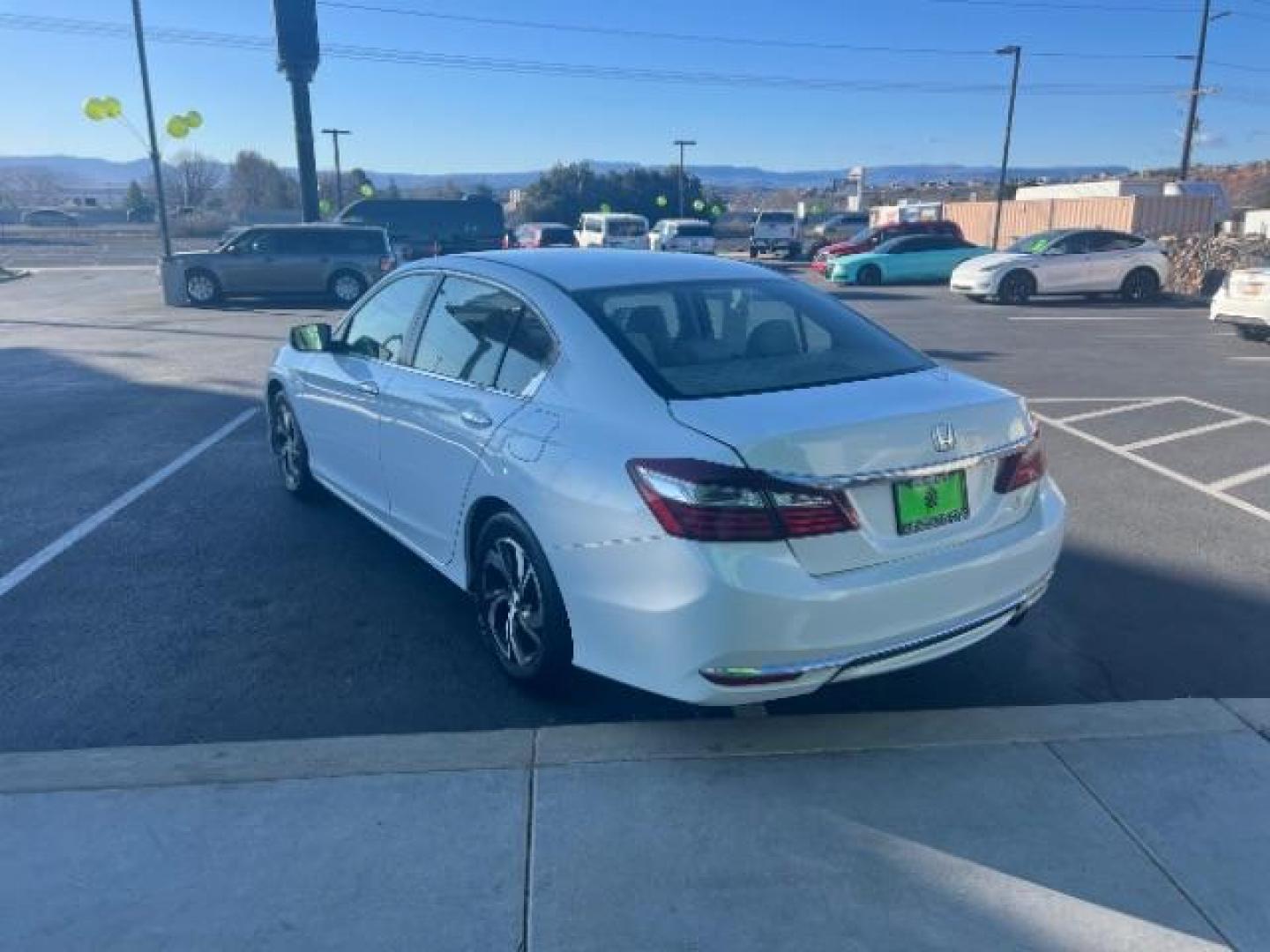 2016 White Orchid Pearl /Ivory Honda Accord LX (1HGCR2F39GA) with an 2.4L I-4 gasoline direct injection engine, Automatic transmission, located at 940 North Main Street, Cedar City, UT, 84720, (435) 628-0023, 37.692936, -113.061897 - We specialize in helping ALL people get the best financing available. No matter your credit score, good, bad or none we can get you an amazing rate. Had a bankruptcy, divorce, or repossessions? We give you the green light to get your credit back on the road. Low down and affordable payments that fit - Photo#4