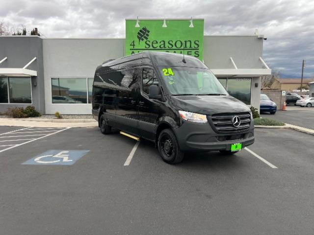 2024 Jet Black /Black Mercedes-Benz Sprinter 2500 High Roof 4-Cyl Diesel (W1Z4KGHY6RT) with an 2L I-4 diesel direct injection engine, Automatic transmission, located at 1865 East Red Hills Pkwy, St. George, 84770, (435) 628-0023, 37.120850, -113.543640 - 15 Passenger in like new condition. This 2024 Mercedes Sprinter 2500 will fit the whole family and the neighbors too. Power sliding door and power step. Leather interior, rear A/C unit, Adapative Cruise control, front seat heater, Diesel engine, 2wd. Near new tires, back up camera with 360 view. We - Photo#0