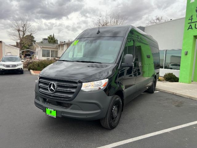2024 Jet Black /Black Mercedes-Benz Sprinter 2500 High Roof 4-Cyl Diesel (W1Z4KGHY6RT) with an 2L I-4 diesel direct injection engine, Automatic transmission, located at 1865 East Red Hills Pkwy, St. George, 84770, (435) 628-0023, 37.120850, -113.543640 - 15 Passenger in like new condition. This 2024 Mercedes Sprinter 2500 will fit the whole family and the neighbors too. Power sliding door and power step. Leather interior, rear A/C unit, Adapative Cruise control, front seat heater, Diesel engine, 2wd. Near new tires, back up camera with 360 view. We - Photo#2