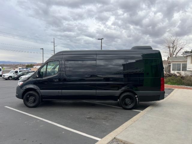 2024 Jet Black /Black Mercedes-Benz Sprinter 2500 High Roof 4-Cyl Diesel (W1Z4KGHY6RT) with an 2L I-4 diesel direct injection engine, Automatic transmission, located at 1865 East Red Hills Pkwy, St. George, 84770, (435) 628-0023, 37.120850, -113.543640 - 15 Passenger in like new condition. This 2024 Mercedes Sprinter 2500 will fit the whole family and the neighbors too. Power sliding door and power step. Leather interior, rear A/C unit, Adapative Cruise control, front seat heater, Diesel engine, 2wd. Near new tires, back up camera with 360 view. We - Photo#3
