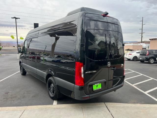 2024 Jet Black /Black Mercedes-Benz Sprinter 2500 High Roof 4-Cyl Diesel (W1Z4KGHY6RT) with an 2L I-4 diesel direct injection engine, Automatic transmission, located at 1865 East Red Hills Pkwy, St. George, 84770, (435) 628-0023, 37.120850, -113.543640 - 15 Passenger in like new condition. This 2024 Mercedes Sprinter 2500 will fit the whole family and the neighbors too. Power sliding door and power step. Leather interior, rear A/C unit, Adapative Cruise control, front seat heater, Diesel engine, 2wd. Near new tires, back up camera with 360 view. We - Photo#4