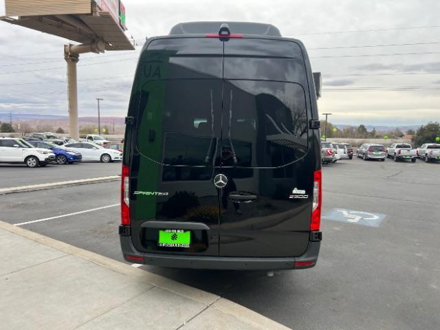 2024 Jet Black /Black Mercedes-Benz Sprinter 2500 High Roof 4-Cyl Diesel (W1Z4KGHY6RT) with an 2L I-4 diesel direct injection engine, Automatic transmission, located at 1865 East Red Hills Pkwy, St. George, 84770, (435) 628-0023, 37.120850, -113.543640 - 15 Passenger in like new condition. This 2024 Mercedes Sprinter 2500 will fit the whole family and the neighbors too. Power sliding door and power step. Leather interior, rear A/C unit, Adapative Cruise control, front seat heater, Diesel engine, 2wd. Near new tires, back up camera with 360 view. We - Photo#5