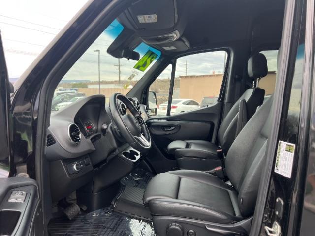 2024 Jet Black /Black Mercedes-Benz Sprinter 2500 High Roof 4-Cyl Diesel (W1Z4KGHY6RT) with an 2L I-4 diesel direct injection engine, Automatic transmission, located at 1865 East Red Hills Pkwy, St. George, 84770, (435) 628-0023, 37.120850, -113.543640 - 15 Passenger in like new condition. This 2024 Mercedes Sprinter 2500 will fit the whole family and the neighbors too. Power sliding door and power step. Leather interior, rear A/C unit, Adapative Cruise control, front seat heater, Diesel engine, 2wd. Near new tires, back up camera with 360 view. We - Photo#14