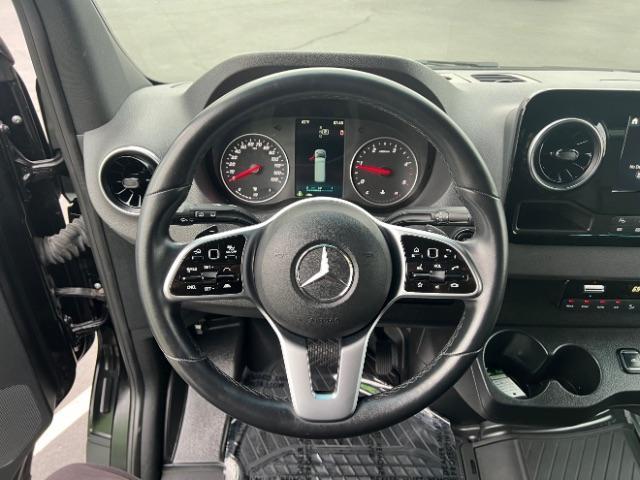 2024 Jet Black /Black Mercedes-Benz Sprinter 2500 High Roof 4-Cyl Diesel (W1Z4KGHY6RT) with an 2L I-4 diesel direct injection engine, Automatic transmission, located at 1865 East Red Hills Pkwy, St. George, 84770, (435) 628-0023, 37.120850, -113.543640 - 15 Passenger in like new condition. This 2024 Mercedes Sprinter 2500 will fit the whole family and the neighbors too. Power sliding door and power step. Leather interior, rear A/C unit, Adapative Cruise control, front seat heater, Diesel engine, 2wd. Near new tires, back up camera with 360 view. We - Photo#15