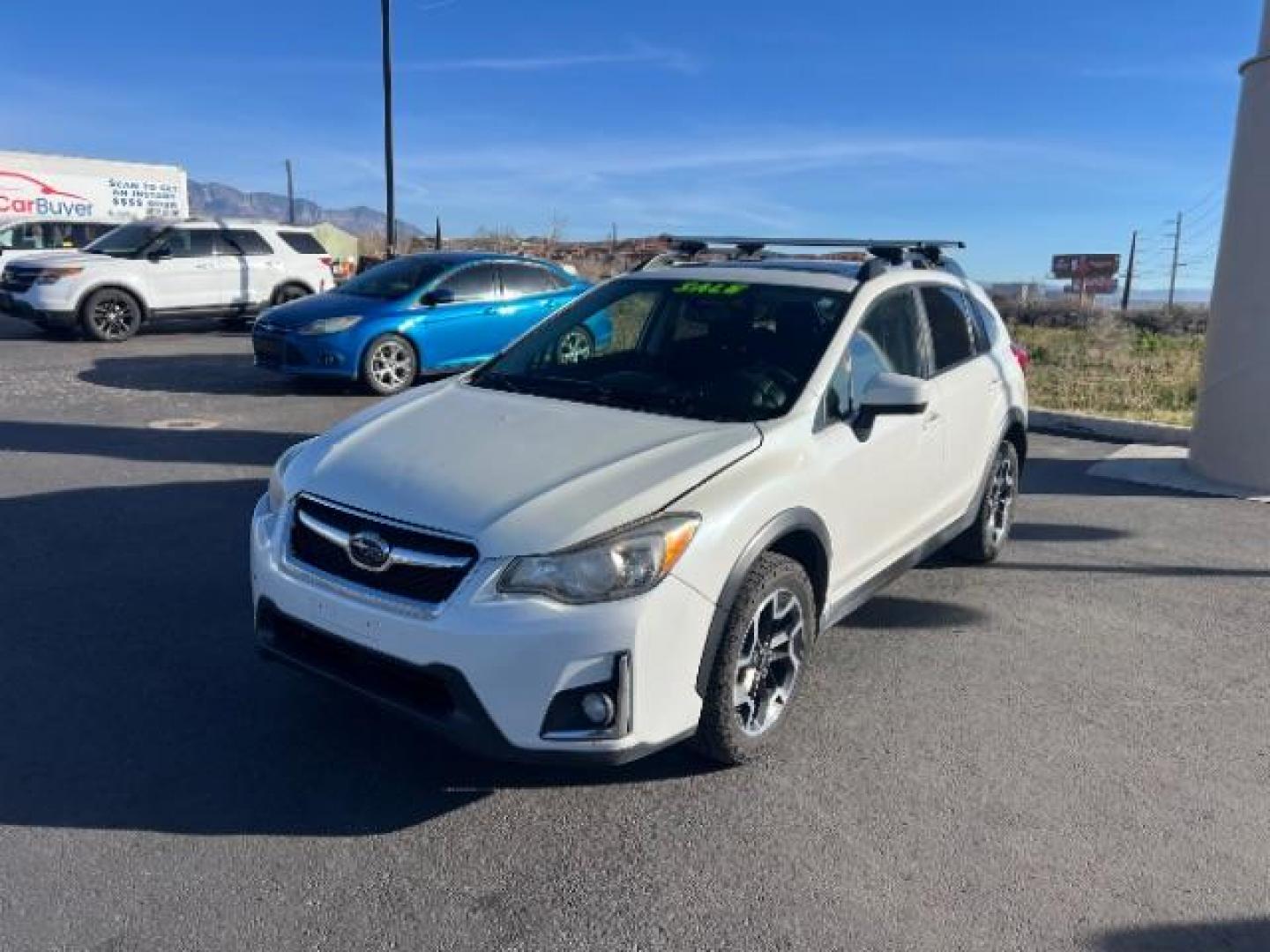 2016 Crystal White Pearl /Black Subaru Crosstrek 2.0i Premium (JF2GPABC2GH) with an 2L H-4 DOHC engine, Automatic transmission, located at 1865 East Red Hills Pkwy, St. George, 84770, (435) 628-0023, 37.120850, -113.543640 - This vehicle is a Mechanic Special. This means it will need some love. Runs a drives fine but has body damage, leaks or other mechanical issues. It did NOT pass our 50 point inspection. Get a great deal on a less than perfect car. These cars do NOT qualify for our in house financing. Cash and carry, - Photo#2