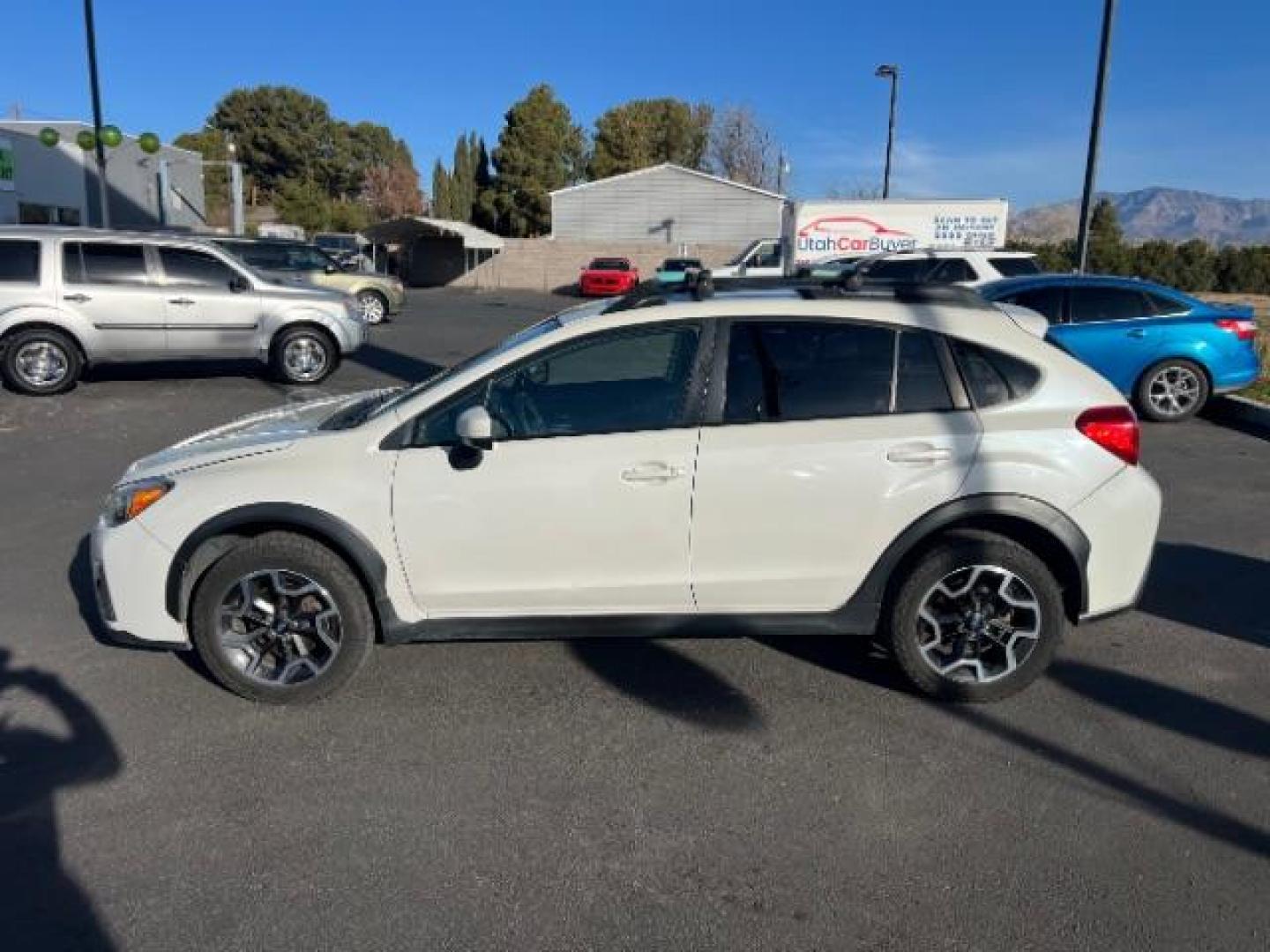 2016 Crystal White Pearl /Black Subaru Crosstrek 2.0i Premium (JF2GPABC2GH) with an 2L H-4 DOHC engine, Automatic transmission, located at 1865 East Red Hills Pkwy, St. George, 84770, (435) 628-0023, 37.120850, -113.543640 - This vehicle is a Mechanic Special. This means it will need some love. Runs a drives fine but has body damage, leaks or other mechanical issues. It did NOT pass our 50 point inspection. Get a great deal on a less than perfect car. These cars do NOT qualify for our in house financing. Cash and carry, - Photo#3