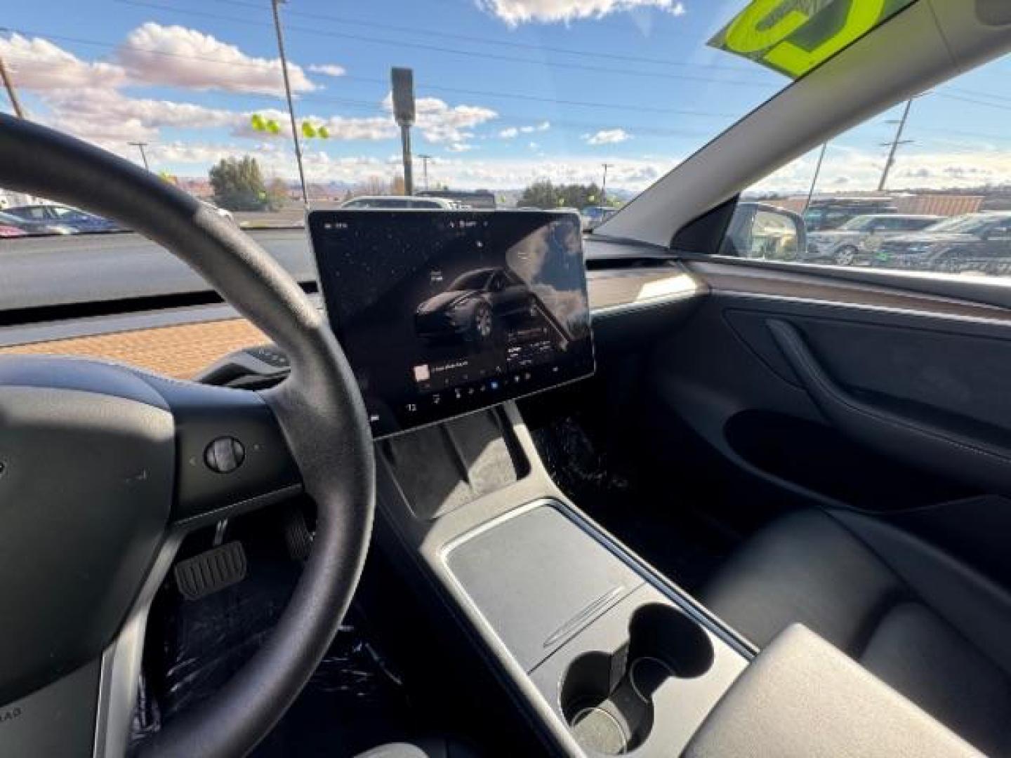 2023 Midnight Silver Metallic /Black Tesla Model Y Long Range Dual Motor All-Wheel Drive | AWD (7SAYGDEE6PF) with an ELECTRIC engine, Electric transmission, located at 1865 East Red Hills Pkwy, St. George, 84770, (435) 628-0023, 37.120850, -113.543640 - Excellent Tesla Model Y Long Range All Wheel Drive. With Hardware 4, All our Teslas come with charging kit Battery is 90% healthy. Gets 290 on full charge. Clean title, no accidents Still has remaining 120k mile Tesla warranty on battery and motor. We have aftermarket battery warranties available - Photo#11