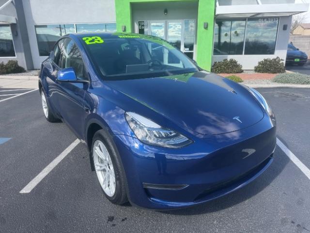 2023 Deep Blue Metallic /Black Tesla Model Y Long Range Dual Motor All-Wheel Drive | AWD (7SAYGDEE3PA) with an ELECTRIC engine, Electric transmission, located at 1865 East Red Hills Pkwy, St. George, 84770, (435) 628-0023, 37.120850, -113.543640 - Excellent Tesla Model Y Long Range All Wheel Drive. With Acceleration Boost paid for ($2k add on) All our Teslas come with charging kit Battery is 98% healthy. Gets 310 on full charge. Clean title, no accidents Still has remaining 120k mile Tesla warranty on battery and motor. We have aftermarket - Photo#1