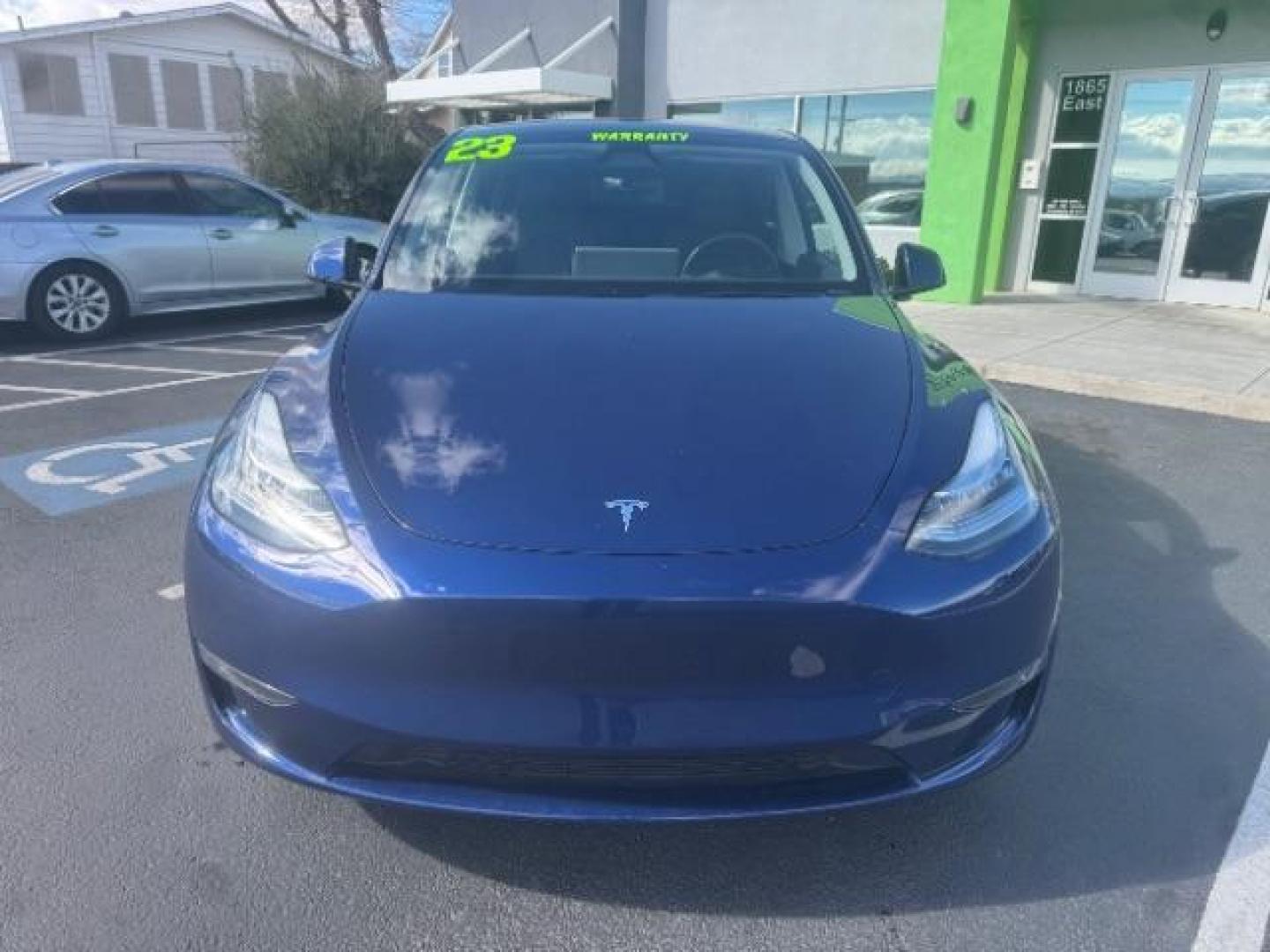 2023 Deep Blue Metallic /Black Tesla Model Y Long Range Dual Motor All-Wheel Drive | AWD (7SAYGDEE3PA) with an ELECTRIC engine, Electric transmission, located at 1865 East Red Hills Pkwy, St. George, 84770, (435) 628-0023, 37.120850, -113.543640 - Excellent Tesla Model Y Long Range All Wheel Drive. With Acceleration Boost paid for ($2k add on) All our Teslas come with charging kit Battery is 98% healthy. Gets 310 on full charge. Clean title, no accidents Still has remaining 120k mile Tesla warranty on battery and motor. We have aftermarket - Photo#2