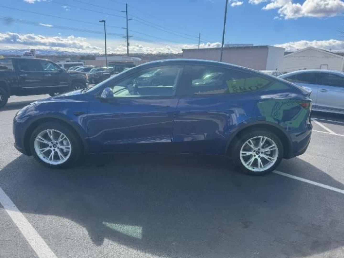 2023 Deep Blue Metallic /Black Tesla Model Y Long Range Dual Motor All-Wheel Drive | AWD (7SAYGDEE3PA) with an ELECTRIC engine, Electric transmission, located at 1865 East Red Hills Pkwy, St. George, 84770, (435) 628-0023, 37.120850, -113.543640 - Excellent Tesla Model Y Long Range All Wheel Drive. With Acceleration Boost paid for ($2k add on) All our Teslas come with charging kit Battery is 98% healthy. Gets 310 on full charge. Clean title, no accidents Still has remaining 120k mile Tesla warranty on battery and motor. We have aftermarket - Photo#5