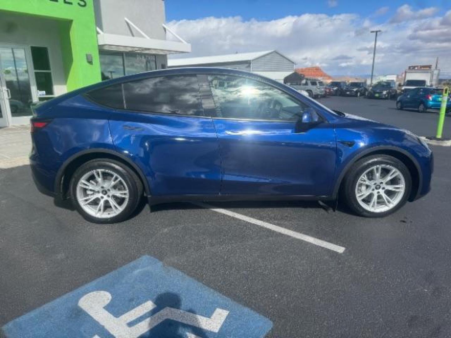 2023 Deep Blue Metallic /Black Tesla Model Y Long Range Dual Motor All-Wheel Drive | AWD (7SAYGDEE3PA) with an ELECTRIC engine, Electric transmission, located at 1865 East Red Hills Pkwy, St. George, 84770, (435) 628-0023, 37.120850, -113.543640 - Excellent Tesla Model Y Long Range All Wheel Drive. With Acceleration Boost paid for ($2k add on) All our Teslas come with charging kit Battery is 98% healthy. Gets 310 on full charge. Clean title, no accidents Still has remaining 120k mile Tesla warranty on battery and motor. We have aftermarket - Photo#9