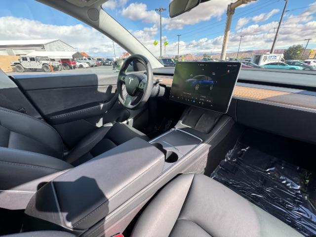 2023 Deep Blue Metallic /Black Tesla Model Y Long Range Dual Motor All-Wheel Drive | AWD (7SAYGDEE3PA) with an ELECTRIC engine, Electric transmission, located at 1865 East Red Hills Pkwy, St. George, 84770, (435) 628-0023, 37.120850, -113.543640 - Excellent Tesla Model Y Long Range All Wheel Drive. With Acceleration Boost paid for ($2k add on) All our Teslas come with charging kit Battery is 98% healthy. Gets 310 on full charge. Clean title, no accidents Still has remaining 120k mile Tesla warranty on battery and motor. We have aftermarket - Photo#22