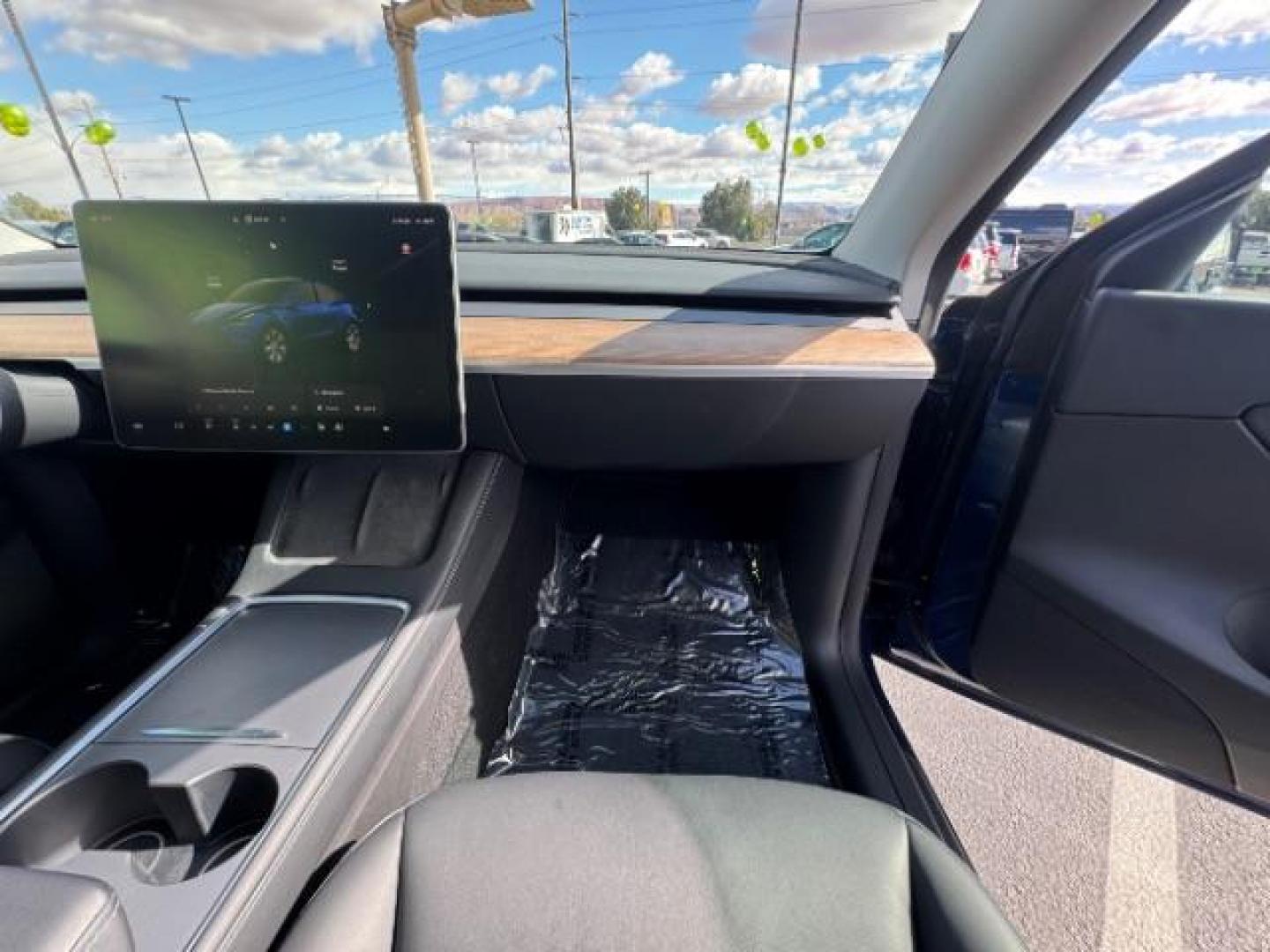 2023 Deep Blue Metallic /Black Tesla Model Y Long Range Dual Motor All-Wheel Drive | AWD (7SAYGDEE3PA) with an ELECTRIC engine, Electric transmission, located at 1865 East Red Hills Pkwy, St. George, 84770, (435) 628-0023, 37.120850, -113.543640 - Excellent Tesla Model Y Long Range All Wheel Drive. With Acceleration Boost paid for ($2k add on) All our Teslas come with charging kit Battery is 98% healthy. Gets 310 on full charge. Clean title, no accidents Still has remaining 120k mile Tesla warranty on battery and motor. We have aftermarket - Photo#23