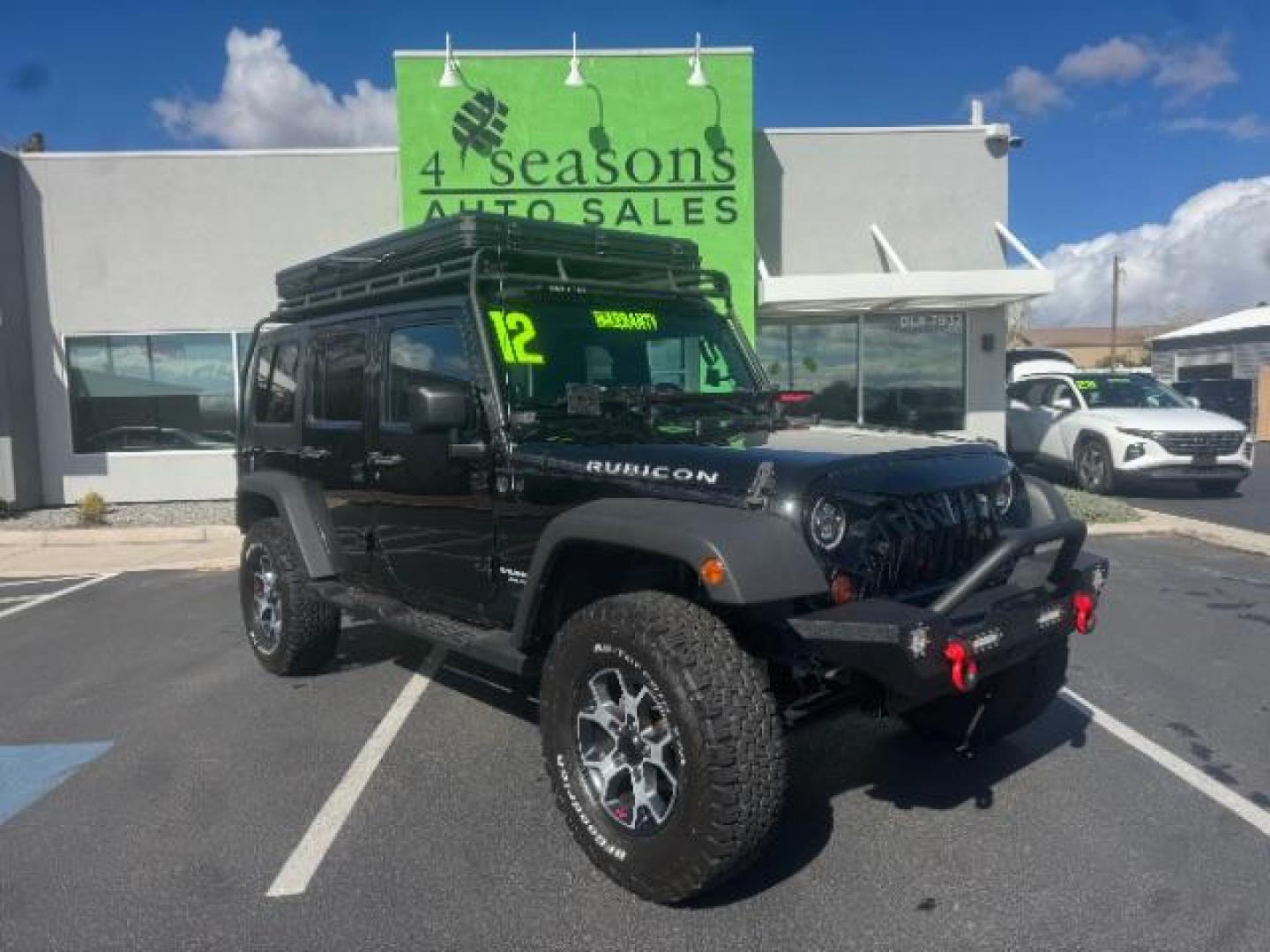 2012 Black /Black Jeep Wrangler Unlimited Rubicon (1C4HJWFG5CL) with an 3.6L V-6 DOHC engine, Automatic transmission, located at 1865 East Red Hills Pkwy, St. George, 84770, (435) 628-0023, 37.120850, -113.543640 - Completely decked out 2012 Jeep Wrangler Unlimited Rubicon. This awesome overlander has $20k in aftermarket features. 4x4, 3.6L engine. Excellent condition. Roof tent, Lift and tires, Front and rear bumper, hood jack, Stepsides, leather, engine tuner, rear storage racks and MORE. Come check it - Photo#0