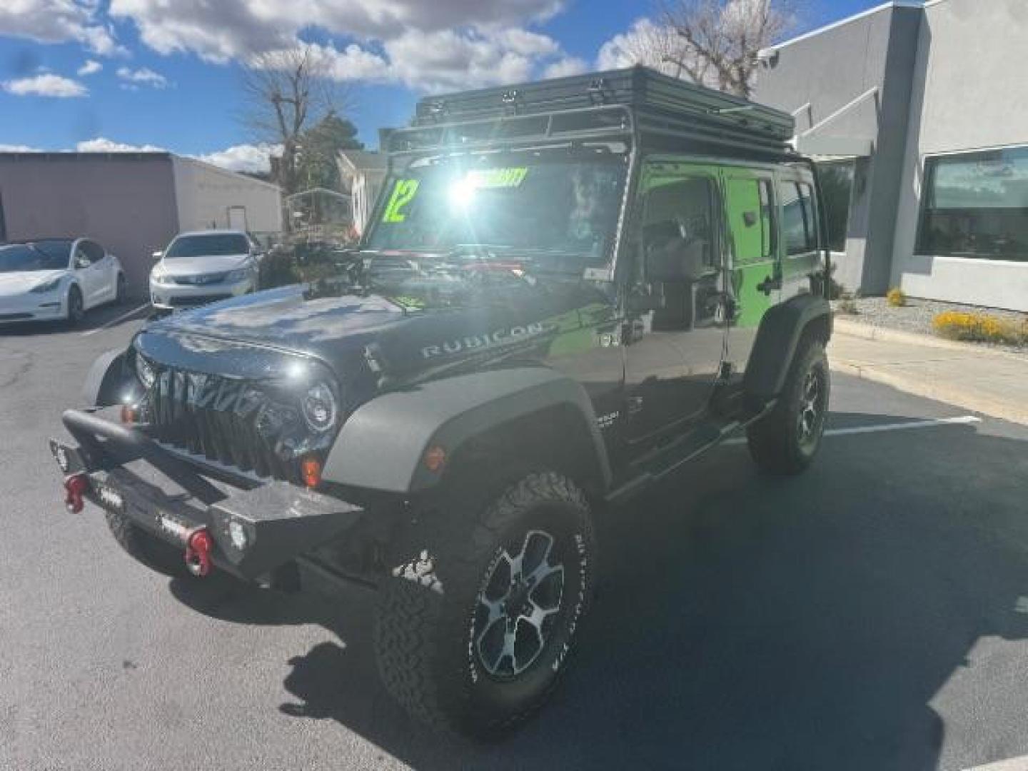 2012 Black /Black Jeep Wrangler Unlimited Rubicon (1C4HJWFG5CL) with an 3.6L V-6 DOHC engine, Automatic transmission, located at 1865 East Red Hills Pkwy, St. George, 84770, (435) 628-0023, 37.120850, -113.543640 - Completely decked out 2012 Jeep Wrangler Unlimited Rubicon. This awesome overlander has $20k in aftermarket features. 4x4, 3.6L engine. Excellent condition. Roof tent, Lift and tires, Front and rear bumper, hood jack, Stepsides, leather, engine tuner, rear storage racks and MORE. Come check it - Photo#3