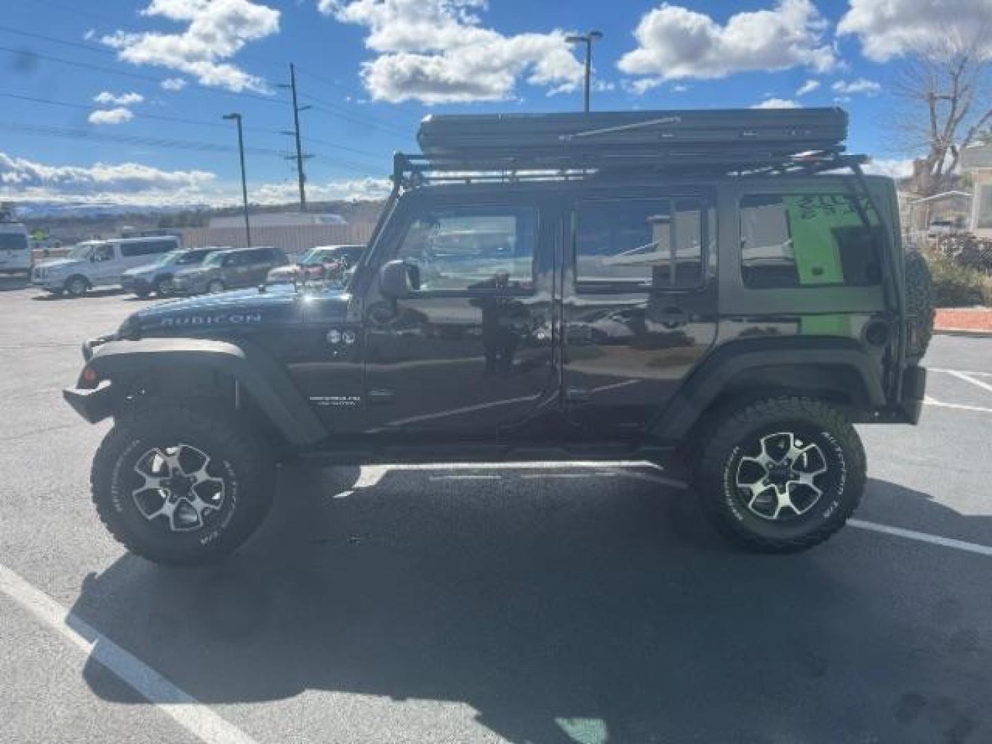 2012 Black /Black Jeep Wrangler Unlimited Rubicon (1C4HJWFG5CL) with an 3.6L V-6 DOHC engine, Automatic transmission, located at 1865 East Red Hills Pkwy, St. George, 84770, (435) 628-0023, 37.120850, -113.543640 - Completely decked out 2012 Jeep Wrangler Unlimited Rubicon. This awesome overlander has $20k in aftermarket features. 4x4, 3.6L engine. Excellent condition. Roof tent, Lift and tires, Front and rear bumper, hood jack, Stepsides, leather, engine tuner, rear storage racks and MORE. Come check it - Photo#4