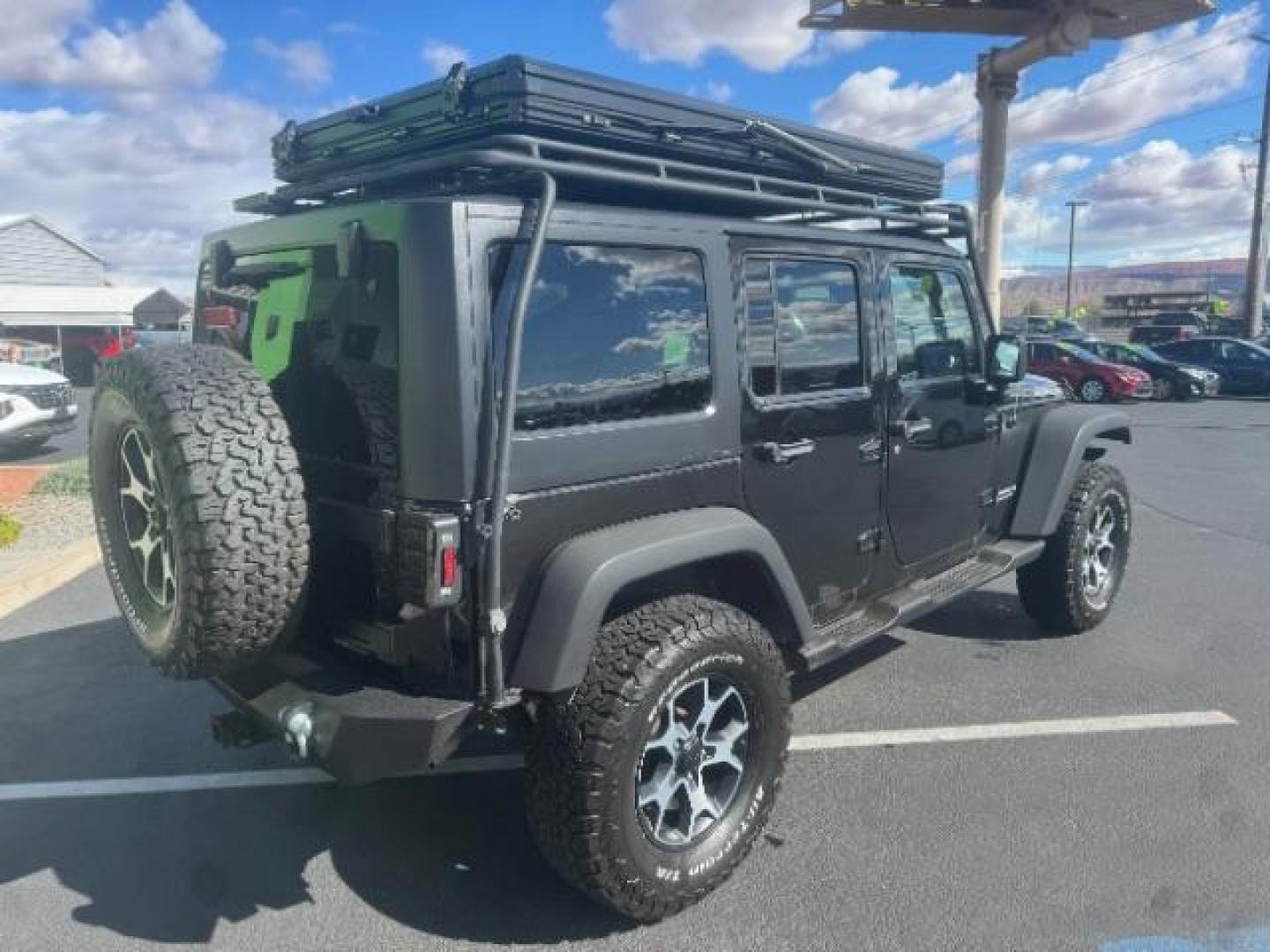 2012 Black /Black Jeep Wrangler Unlimited Rubicon (1C4HJWFG5CL) with an 3.6L V-6 DOHC engine, Automatic transmission, located at 1865 East Red Hills Pkwy, St. George, 84770, (435) 628-0023, 37.120850, -113.543640 - Completely decked out 2012 Jeep Wrangler Unlimited Rubicon. This awesome overlander has $20k in aftermarket features. 4x4, 3.6L engine. Excellent condition. Roof tent, Lift and tires, Front and rear bumper, hood jack, Stepsides, leather, engine tuner, rear storage racks and MORE. Come check it - Photo#7