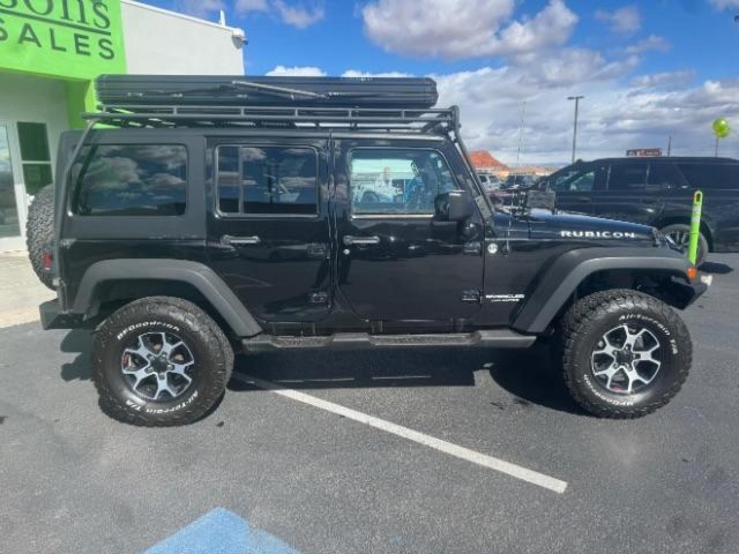 2012 Black /Black Jeep Wrangler Unlimited Rubicon (1C4HJWFG5CL) with an 3.6L V-6 DOHC engine, Automatic transmission, located at 1865 East Red Hills Pkwy, St. George, 84770, (435) 628-0023, 37.120850, -113.543640 - Completely decked out 2012 Jeep Wrangler Unlimited Rubicon. This awesome overlander has $20k in aftermarket features. 4x4, 3.6L engine. Excellent condition. Roof tent, Lift and tires, Front and rear bumper, hood jack, Stepsides, leather, engine tuner, rear storage racks and MORE. Come check it - Photo#8