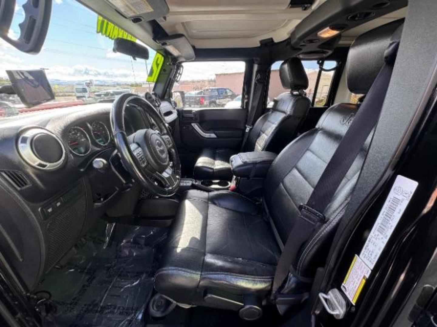 2012 Black /Black Jeep Wrangler Unlimited Rubicon (1C4HJWFG5CL) with an 3.6L V-6 DOHC engine, Automatic transmission, located at 1865 East Red Hills Pkwy, St. George, 84770, (435) 628-0023, 37.120850, -113.543640 - Completely decked out 2012 Jeep Wrangler Unlimited Rubicon. This awesome overlander has $20k in aftermarket features. 4x4, 3.6L engine. Excellent condition. Roof tent, Lift and tires, Front and rear bumper, hood jack, Stepsides, leather, engine tuner, rear storage racks and MORE. Come check it - Photo#9