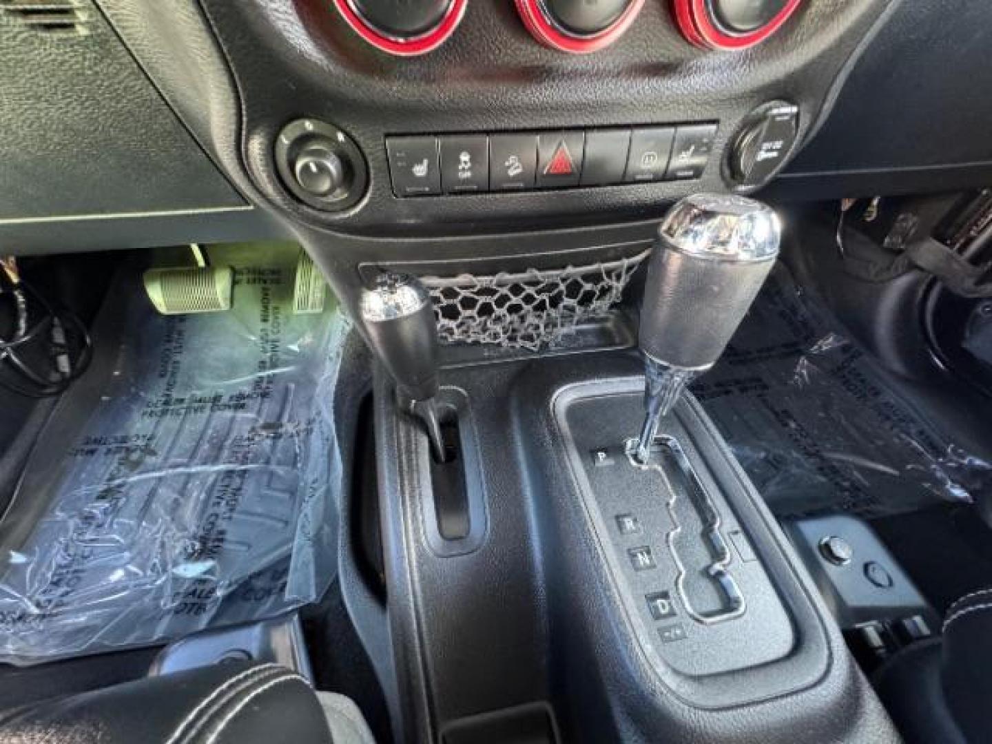 2012 Black /Black Jeep Wrangler Unlimited Rubicon (1C4HJWFG5CL) with an 3.6L V-6 DOHC engine, Automatic transmission, located at 1865 East Red Hills Pkwy, St. George, 84770, (435) 628-0023, 37.120850, -113.543640 - Completely decked out 2012 Jeep Wrangler Unlimited Rubicon. This awesome overlander has $20k in aftermarket features. 4x4, 3.6L engine. Excellent condition. Roof tent, Lift and tires, Front and rear bumper, hood jack, Stepsides, leather, engine tuner, rear storage racks and MORE. Come check it - Photo#12