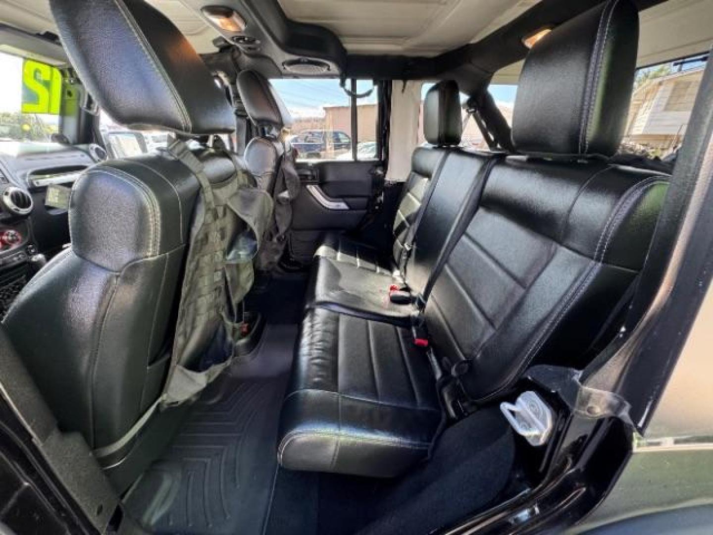 2012 Black /Black Jeep Wrangler Unlimited Rubicon (1C4HJWFG5CL) with an 3.6L V-6 DOHC engine, Automatic transmission, located at 1865 East Red Hills Pkwy, St. George, 84770, (435) 628-0023, 37.120850, -113.543640 - Completely decked out 2012 Jeep Wrangler Unlimited Rubicon. This awesome overlander has $20k in aftermarket features. 4x4, 3.6L engine. Excellent condition. Roof tent, Lift and tires, Front and rear bumper, hood jack, Stepsides, leather, engine tuner, rear storage racks and MORE. Come check it - Photo#18
