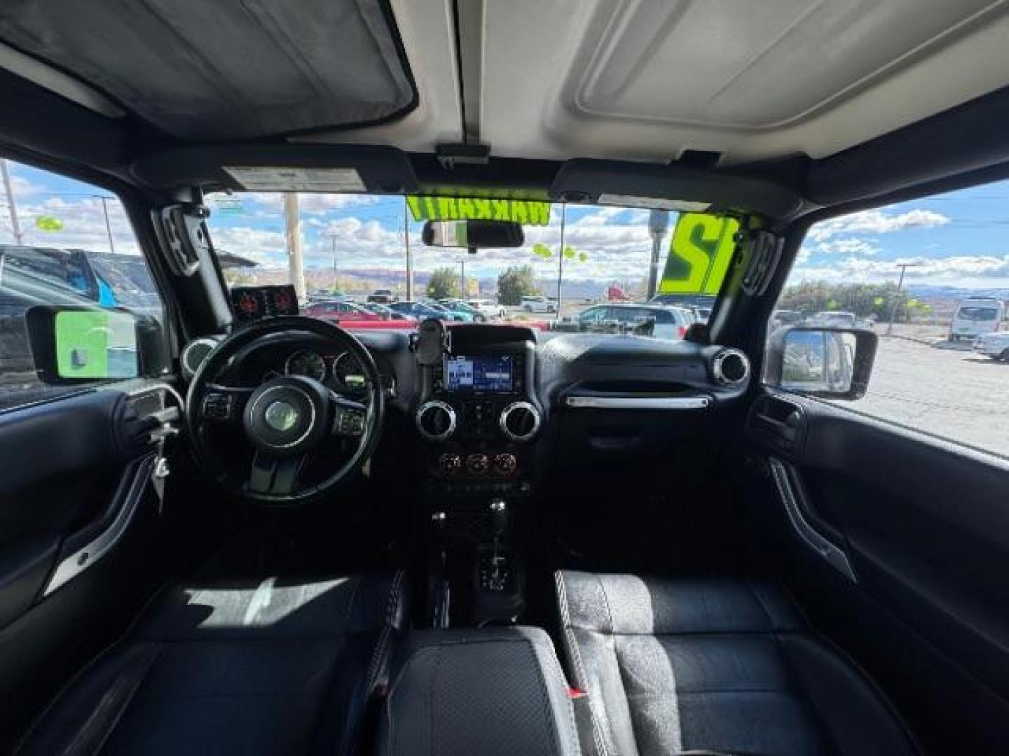 2012 Black /Black Jeep Wrangler Unlimited Rubicon (1C4HJWFG5CL) with an 3.6L V-6 DOHC engine, Automatic transmission, located at 1865 East Red Hills Pkwy, St. George, 84770, (435) 628-0023, 37.120850, -113.543640 - Completely decked out 2012 Jeep Wrangler Unlimited Rubicon. This awesome overlander has $20k in aftermarket features. 4x4, 3.6L engine. Excellent condition. Roof tent, Lift and tires, Front and rear bumper, hood jack, Stepsides, leather, engine tuner, rear storage racks and MORE. Come check it - Photo#19